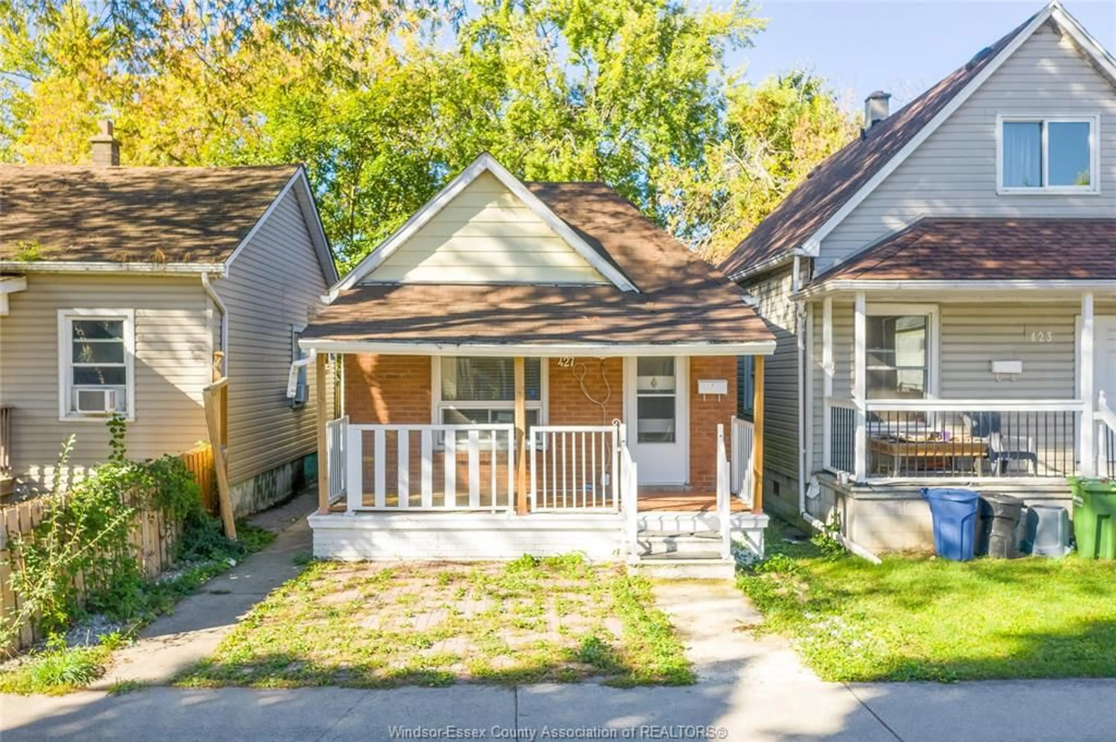 Home with vinyl exterior material, street for 427 BRIDGE Ave, Windsor Ontario N9B 2M3