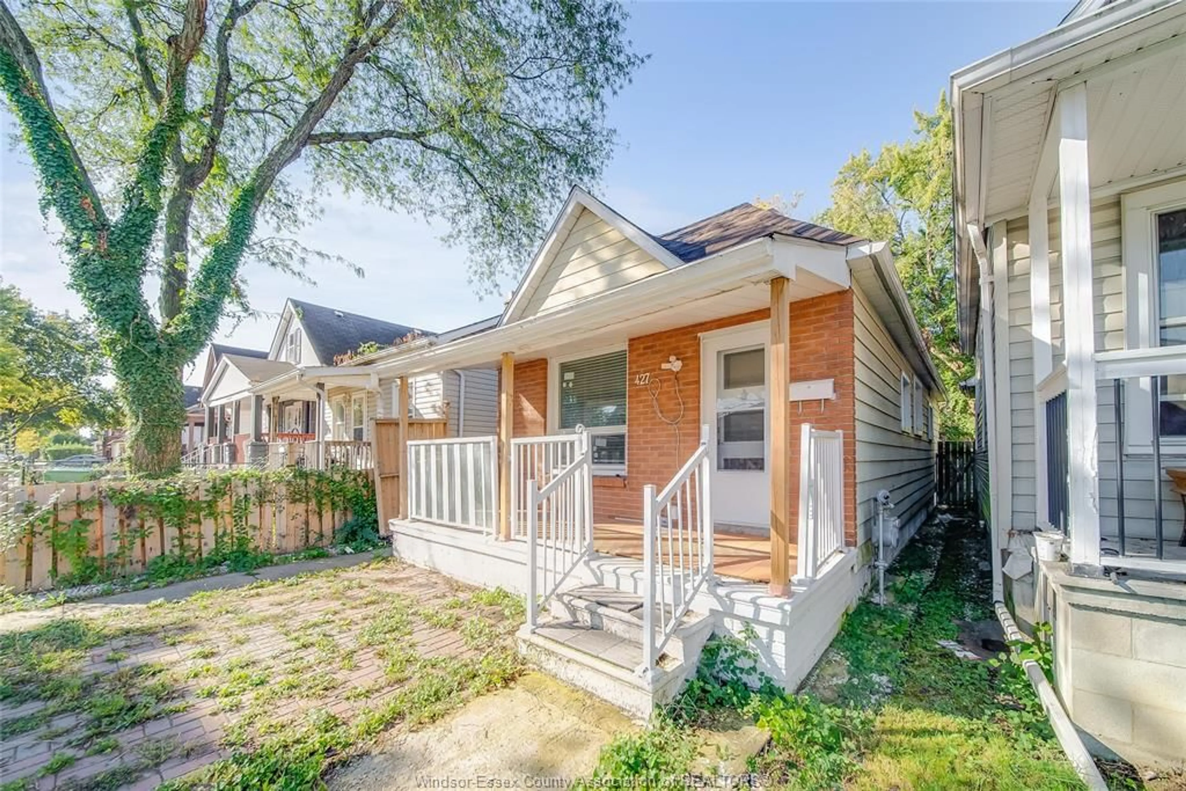 Home with brick exterior material, street for 427 BRIDGE Ave, Windsor Ontario N9B 2M3
