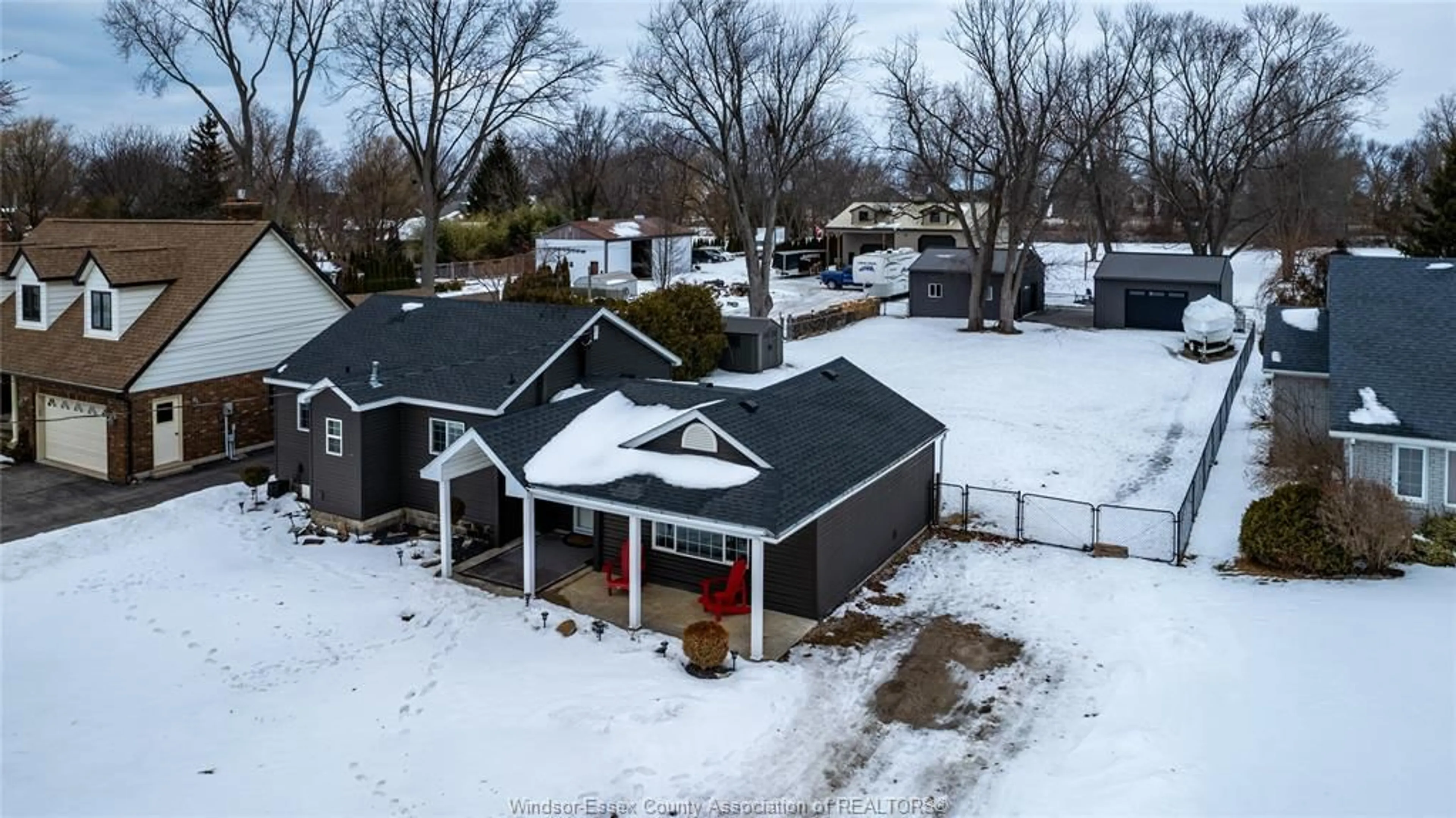 A pic from outside/outdoor area/front of a property/back of a property/a pic from drone, street for 1052 COUNTY RD 22, Lakeshore Ontario N8L 0E1