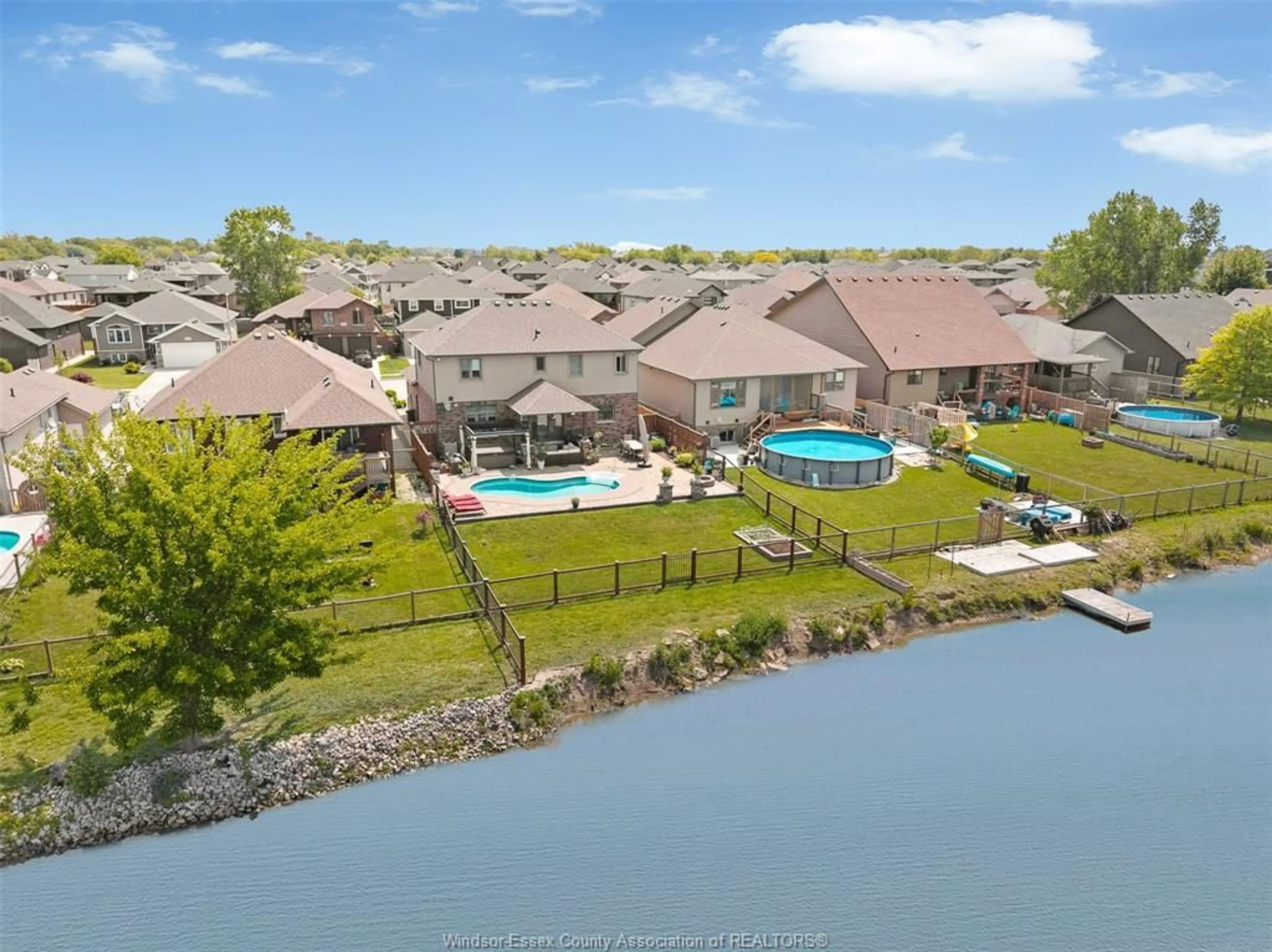 A pic from outside/outdoor area/front of a property/back of a property/a pic from drone, water/lake/river/ocean view for 202 SUMMER St, Lakeshore Ontario N8L 0G6