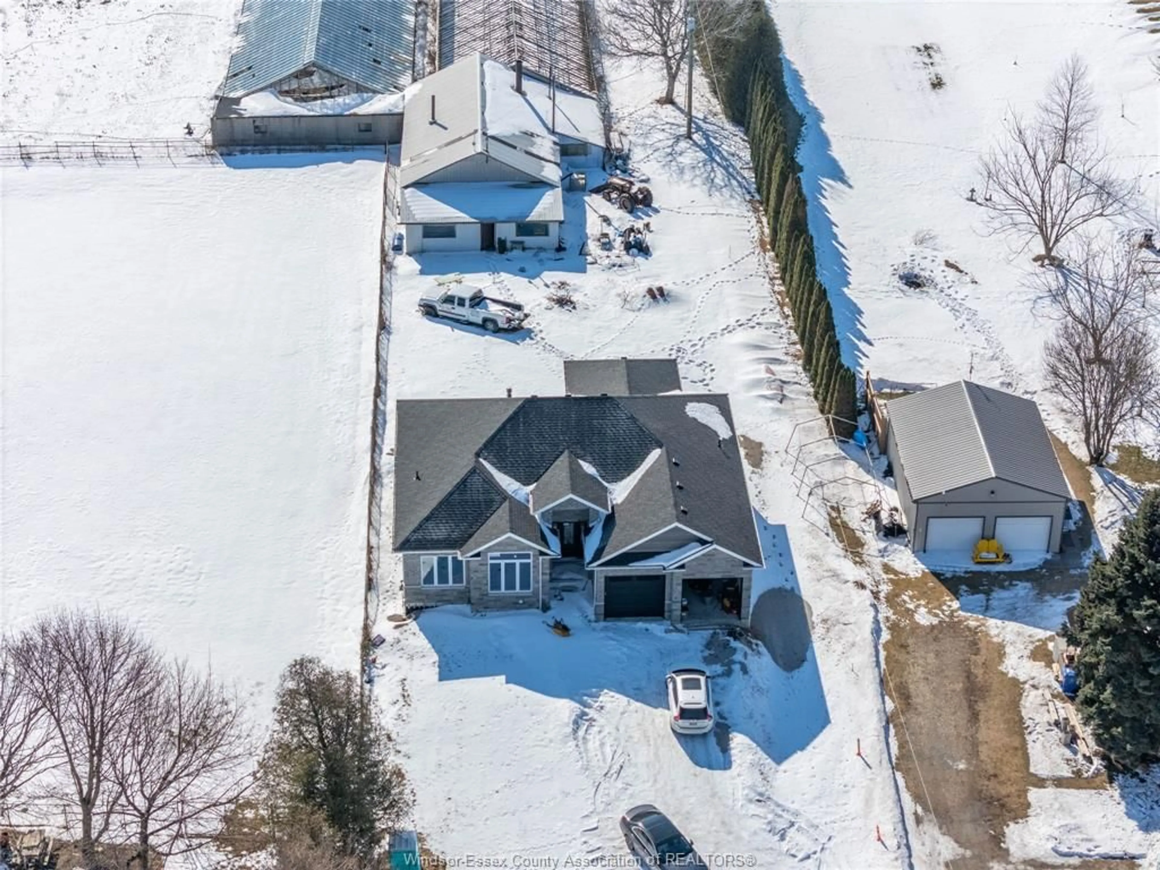 A pic from outside/outdoor area/front of a property/back of a property/a pic from drone, street for 530 MERSEA 3 RD, Leamington Ontario N8H 3V5