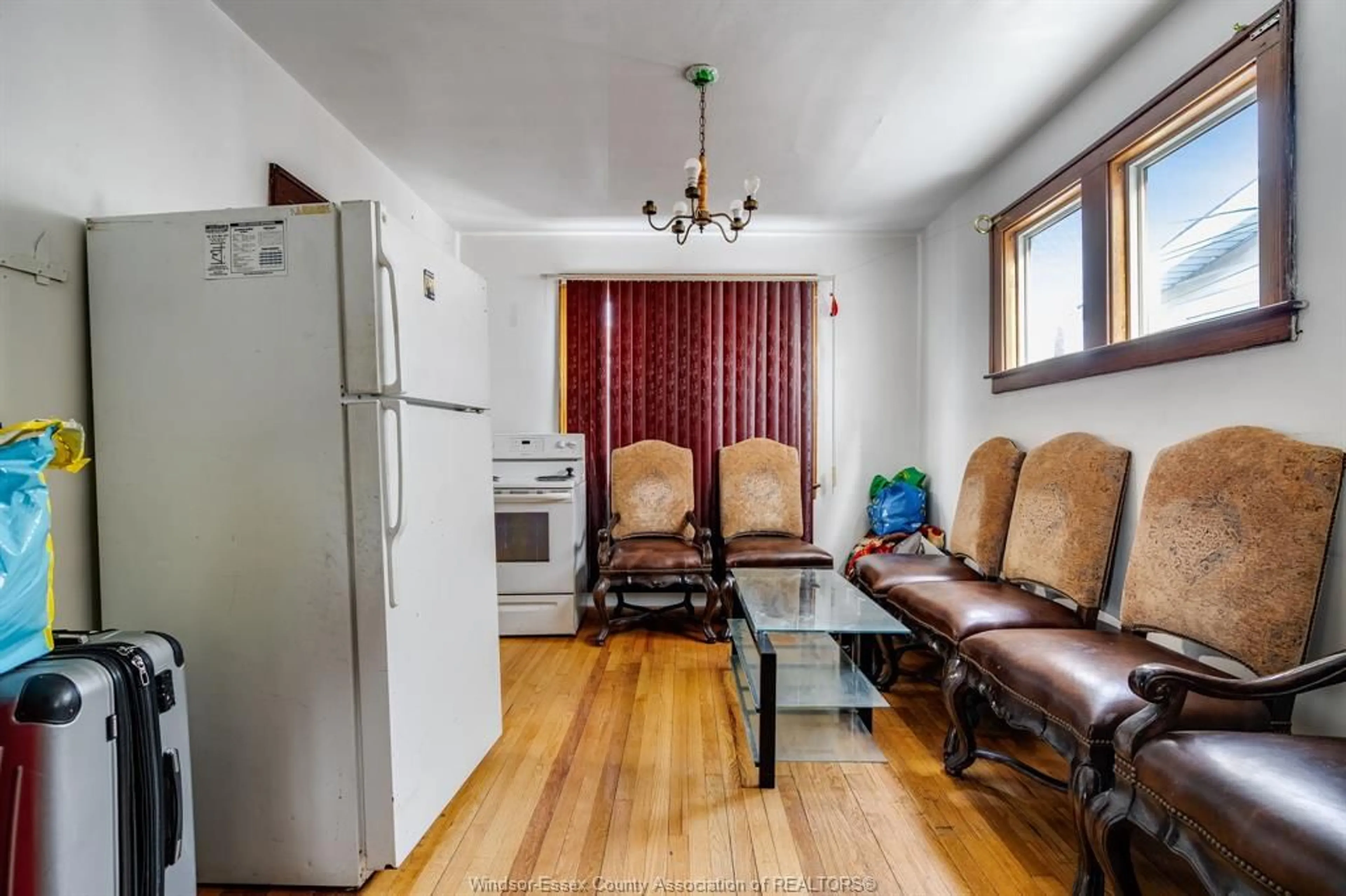 Living room with furniture, wood/laminate floor for 360 Rankin, Windsor Ontario N9B 2R7