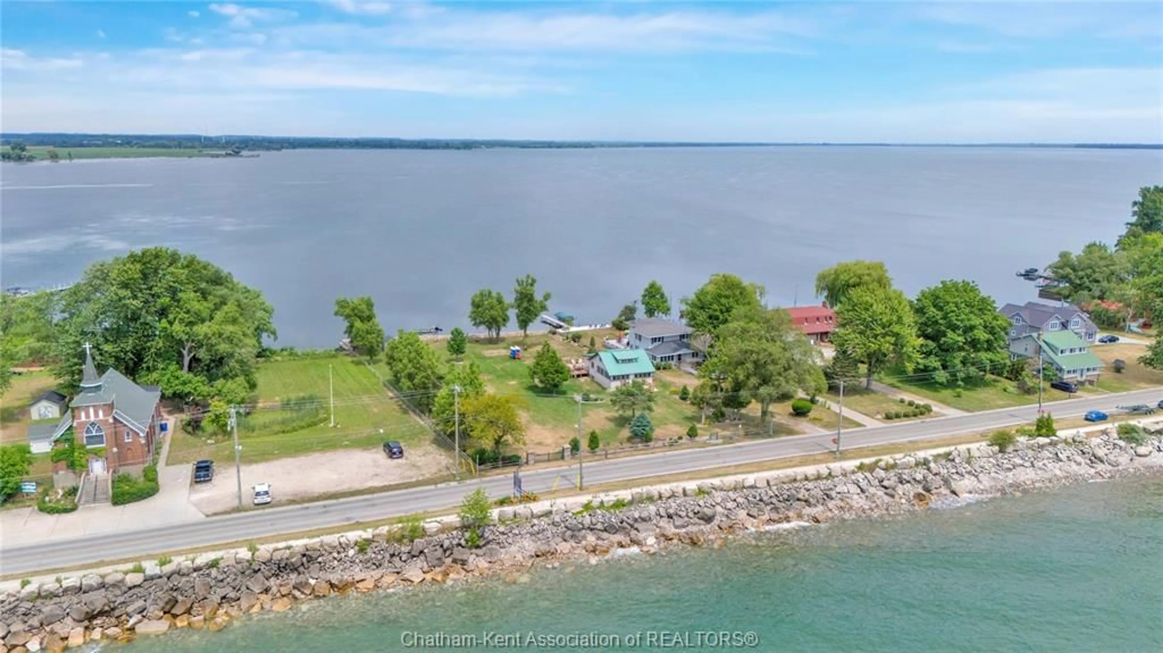 A pic from outside/outdoor area/front of a property/back of a property/a pic from drone, water/lake/river/ocean view for 100 ROSS Lane, Erieau Ontario N0P 1N0