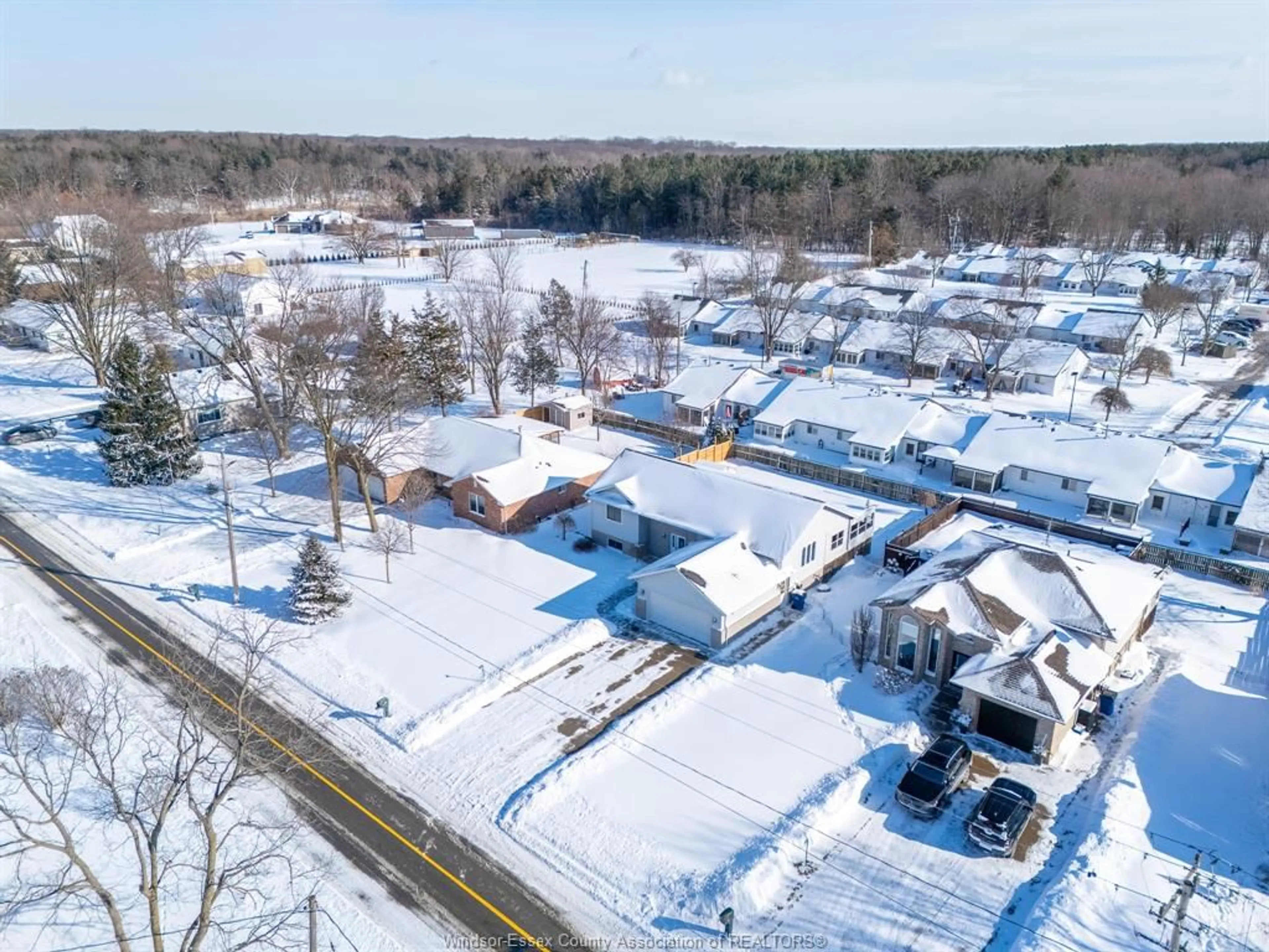 A pic from outside/outdoor area/front of a property/back of a property/a pic from drone, street for 70 Middleton Line, Wheatley Ontario N0P 2P0