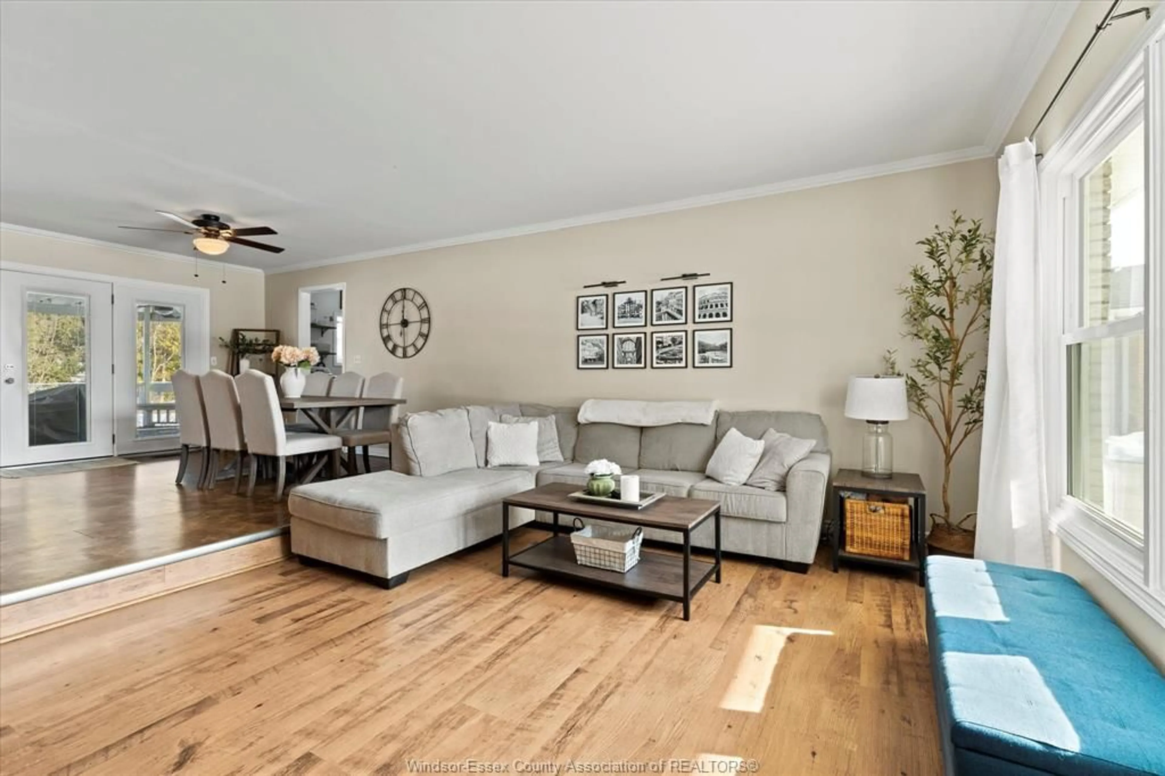 Living room with furniture, wood/laminate floor for 321 Cartier, Belle River Ontario N8L 0N2