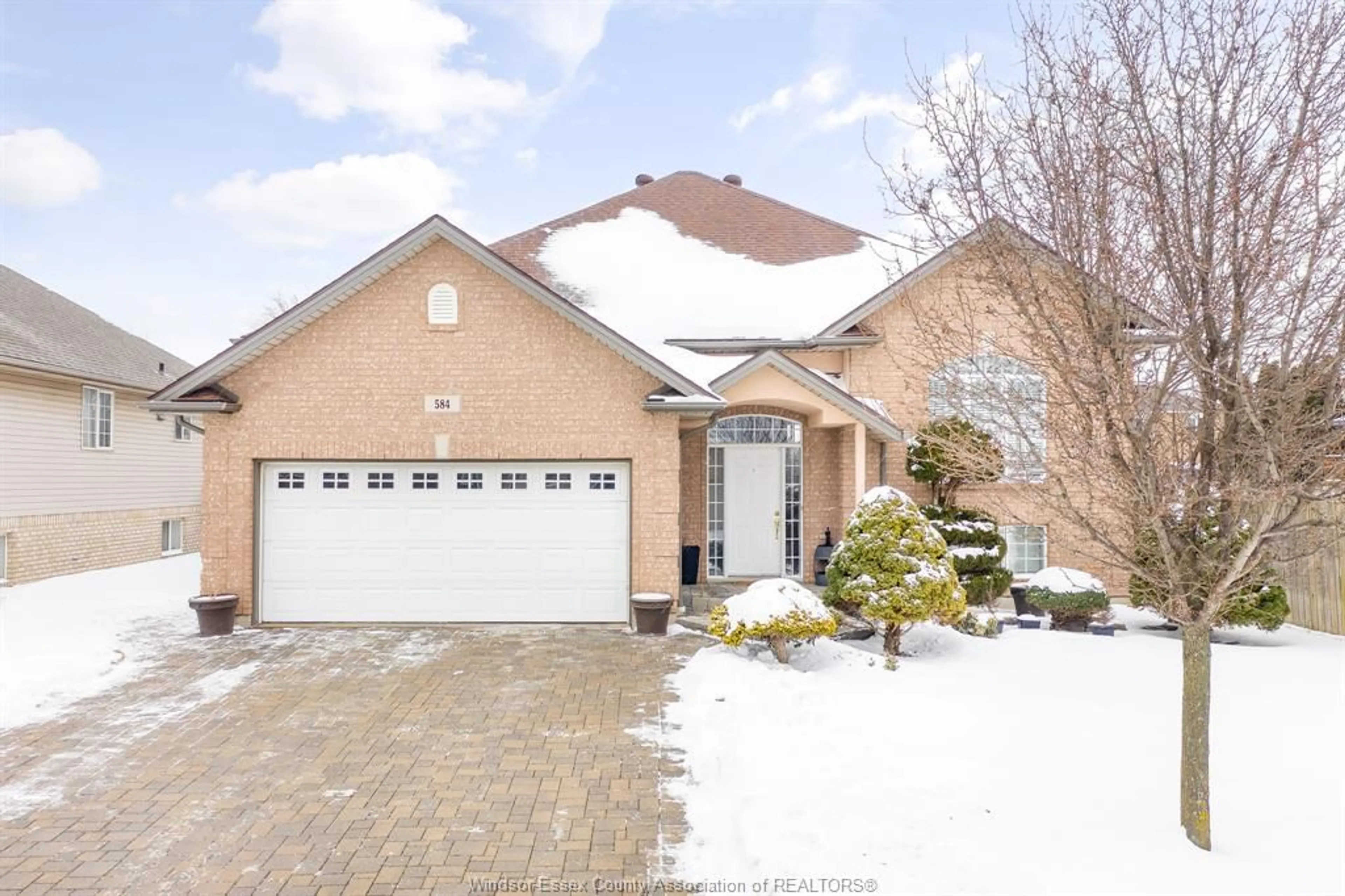 Home with brick exterior material, street for 584 BELLAGIO Dr, Windsor Ontario N8P 1J9