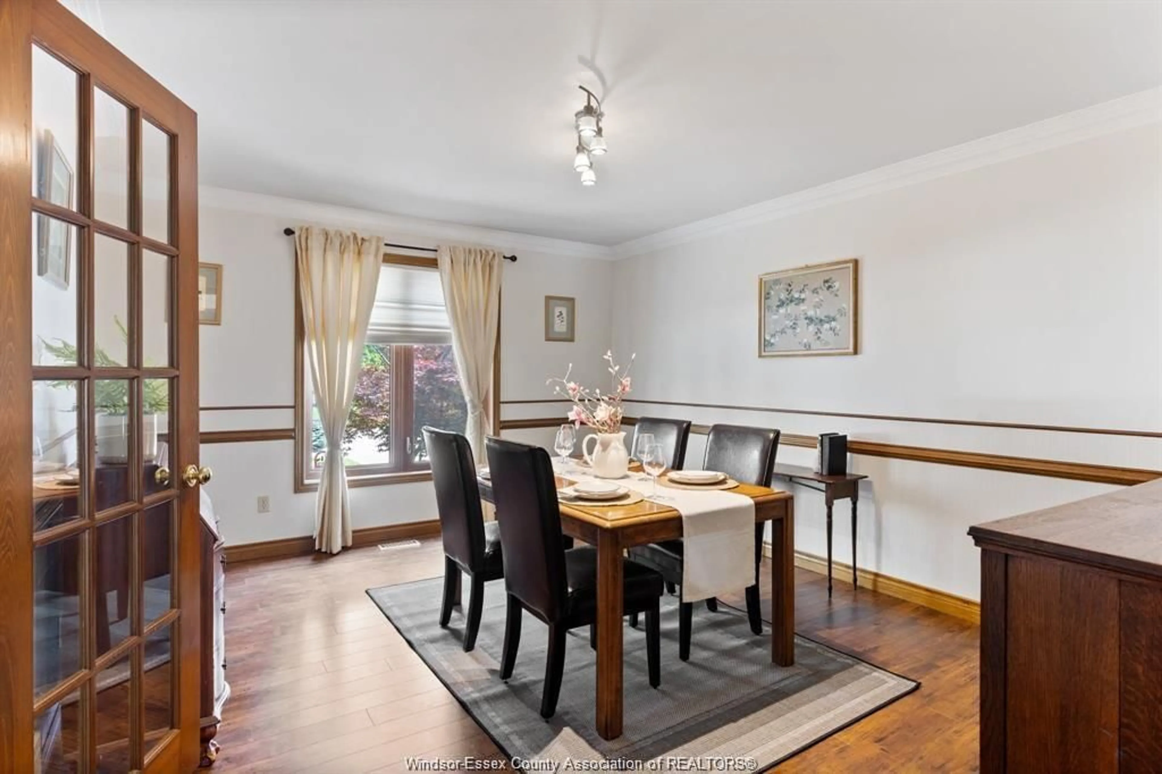 Dining room, wood/laminate floor for 113 Marentette, Lakeshore Ontario N0R 1A0