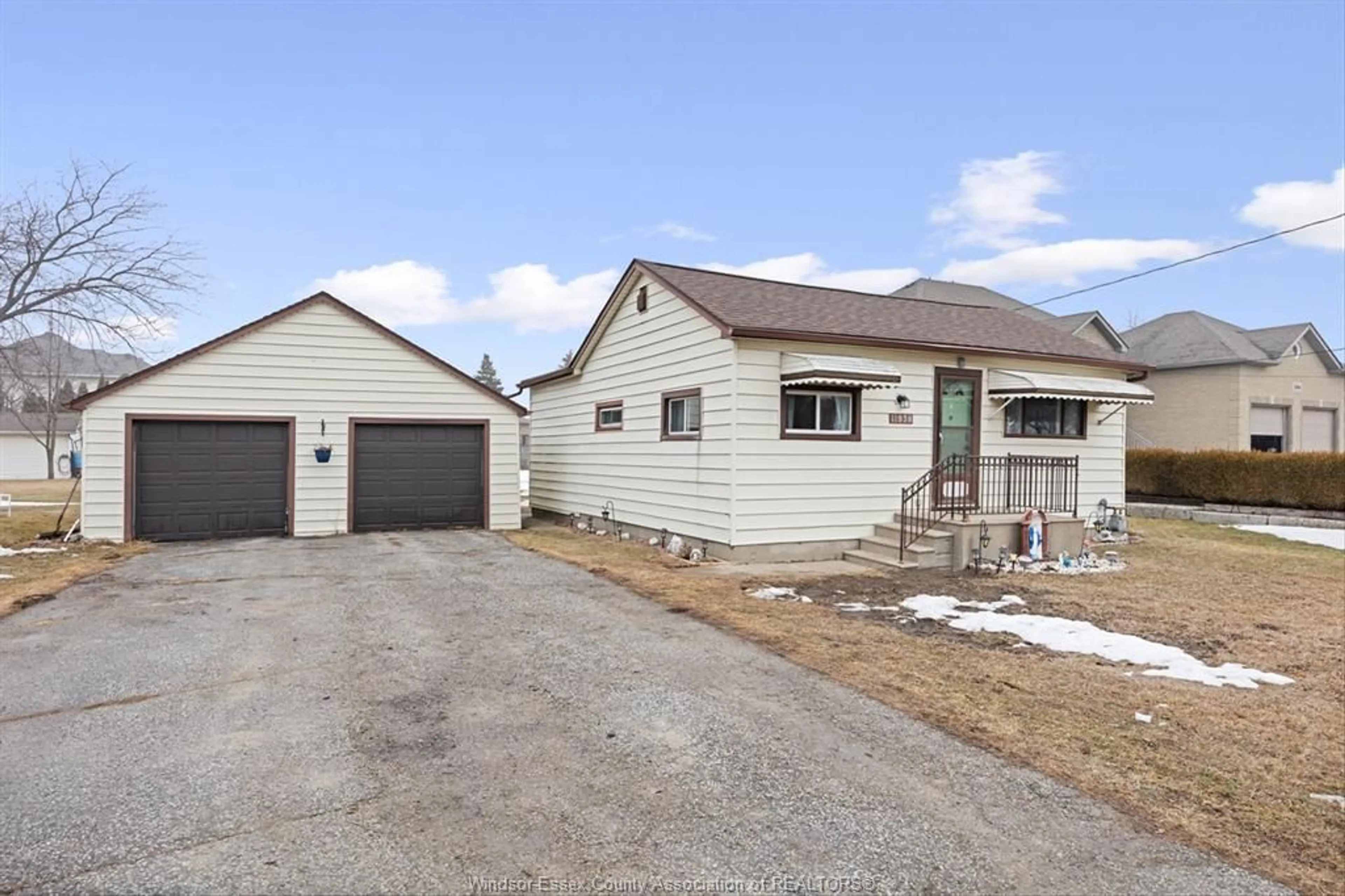 Home with vinyl exterior material, street for 11938 INTERSECTION Rd, Tecumseh Ontario N8N 0H6