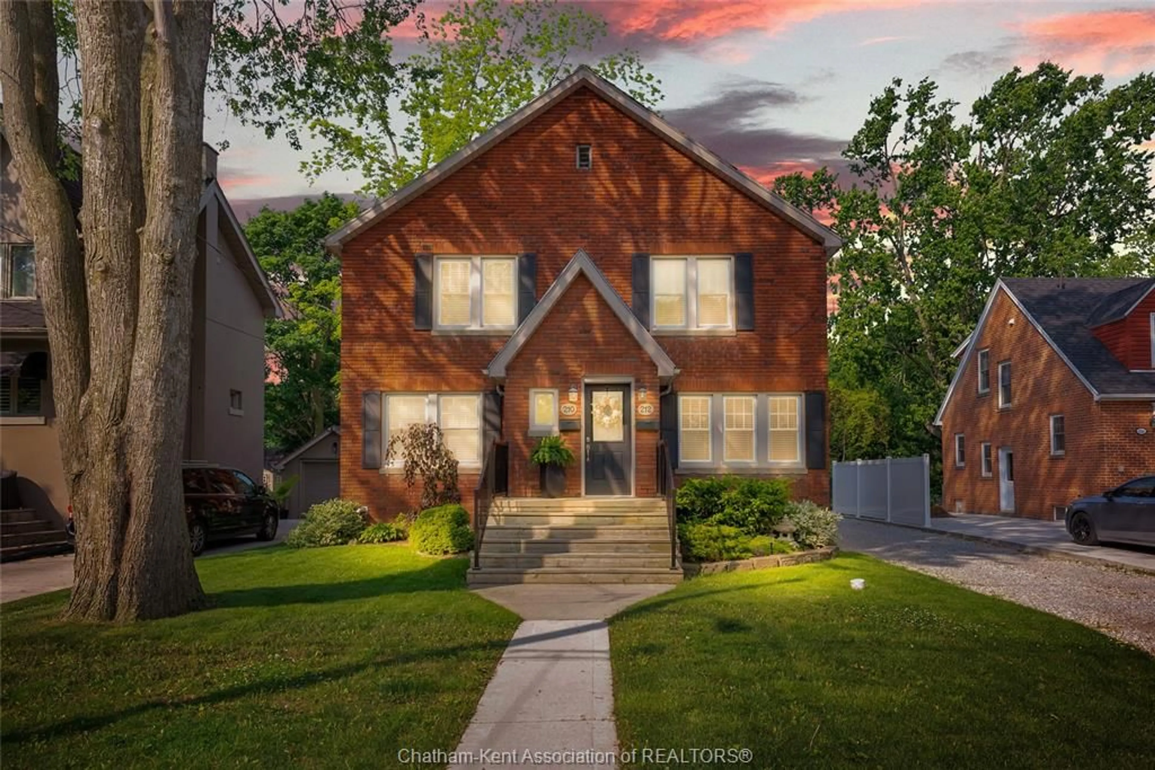Home with brick exterior material, street for 210-212 Elizabeth St, Chatham Ontario N7L 2Y7