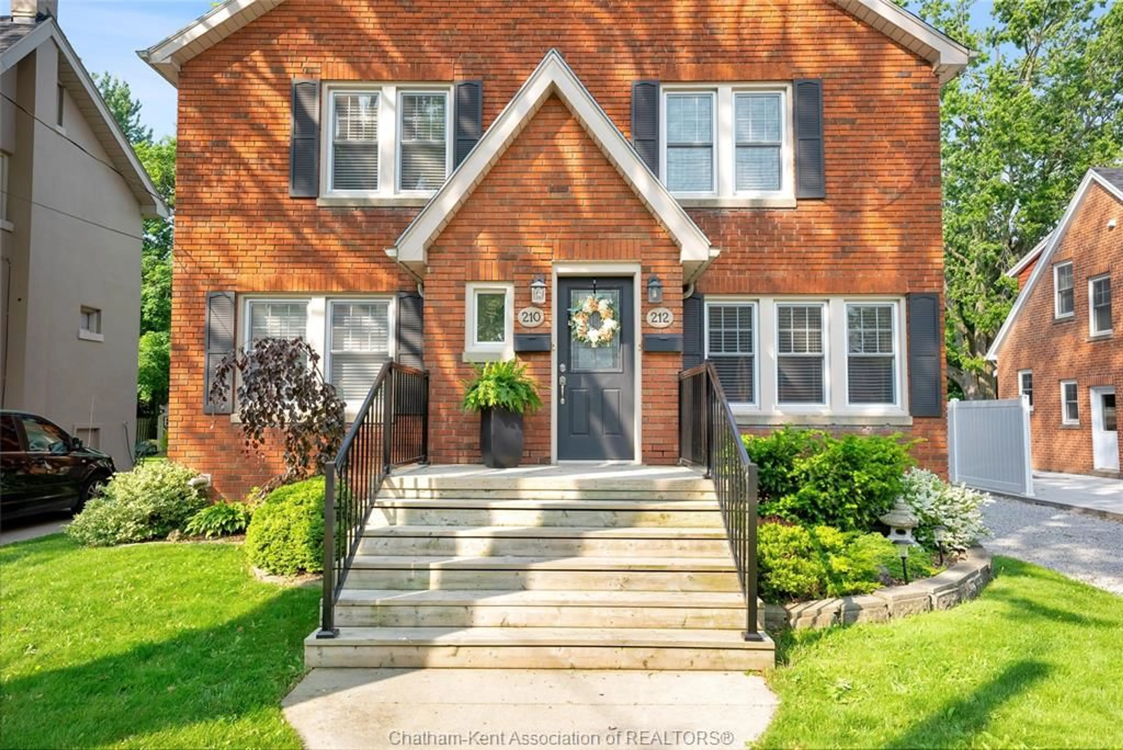 Home with brick exterior material, street for 210-212 Elizabeth St, Chatham Ontario N7L 2Y7