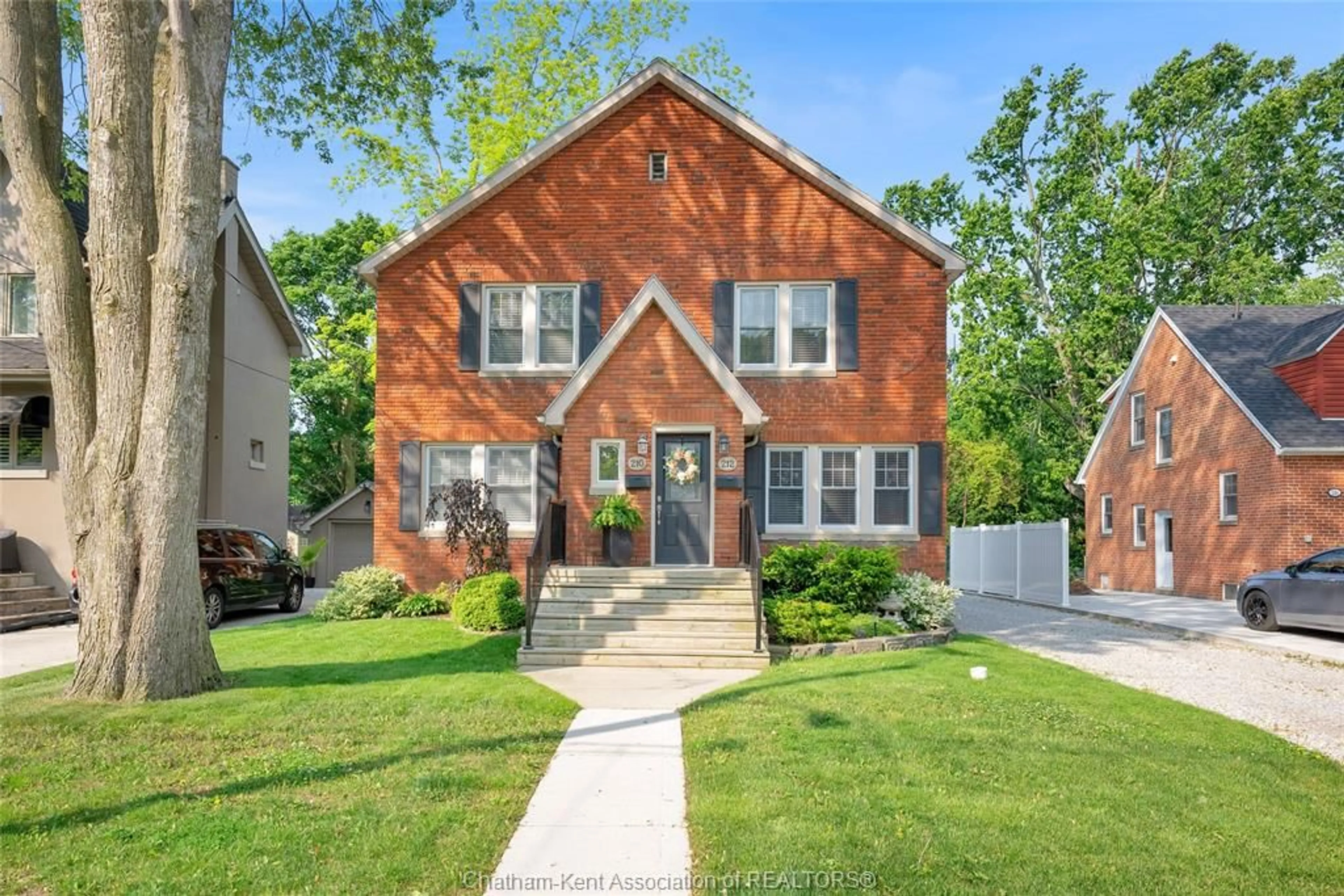 Home with brick exterior material, street for 210-212 Elizabeth St, Chatham Ontario N7L 2Y7