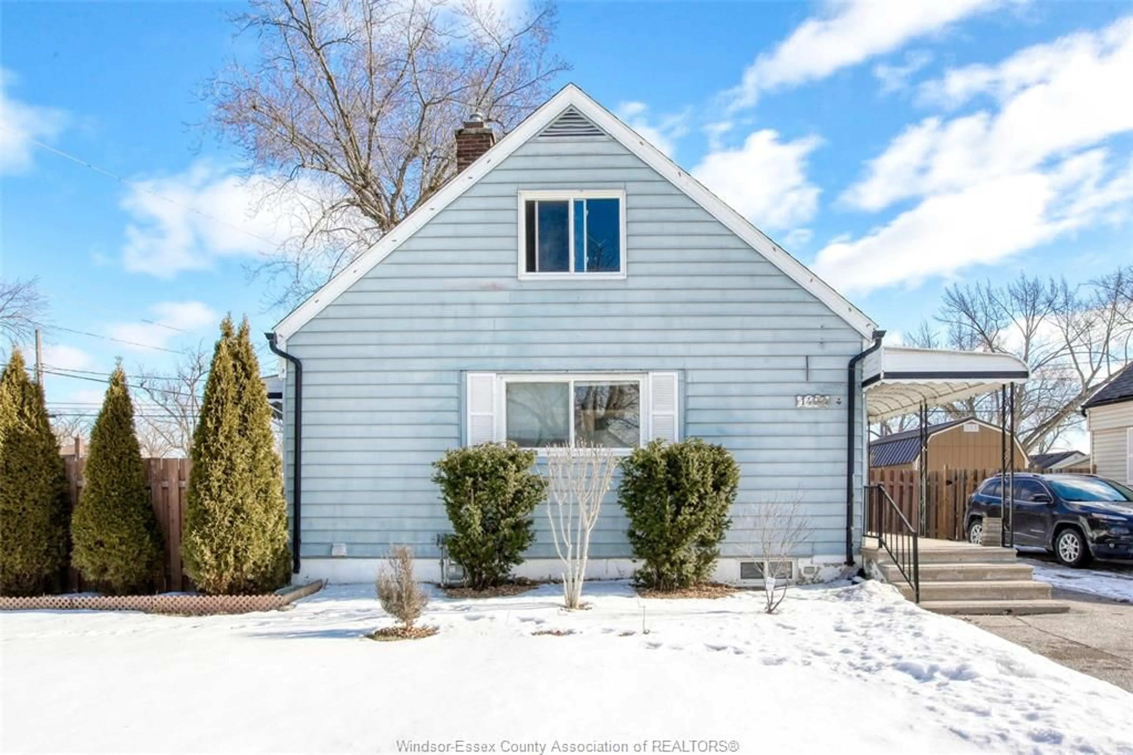 Home with vinyl exterior material, street for 1402 TOURANGEAU, Windsor Ontario N8Y 4J2