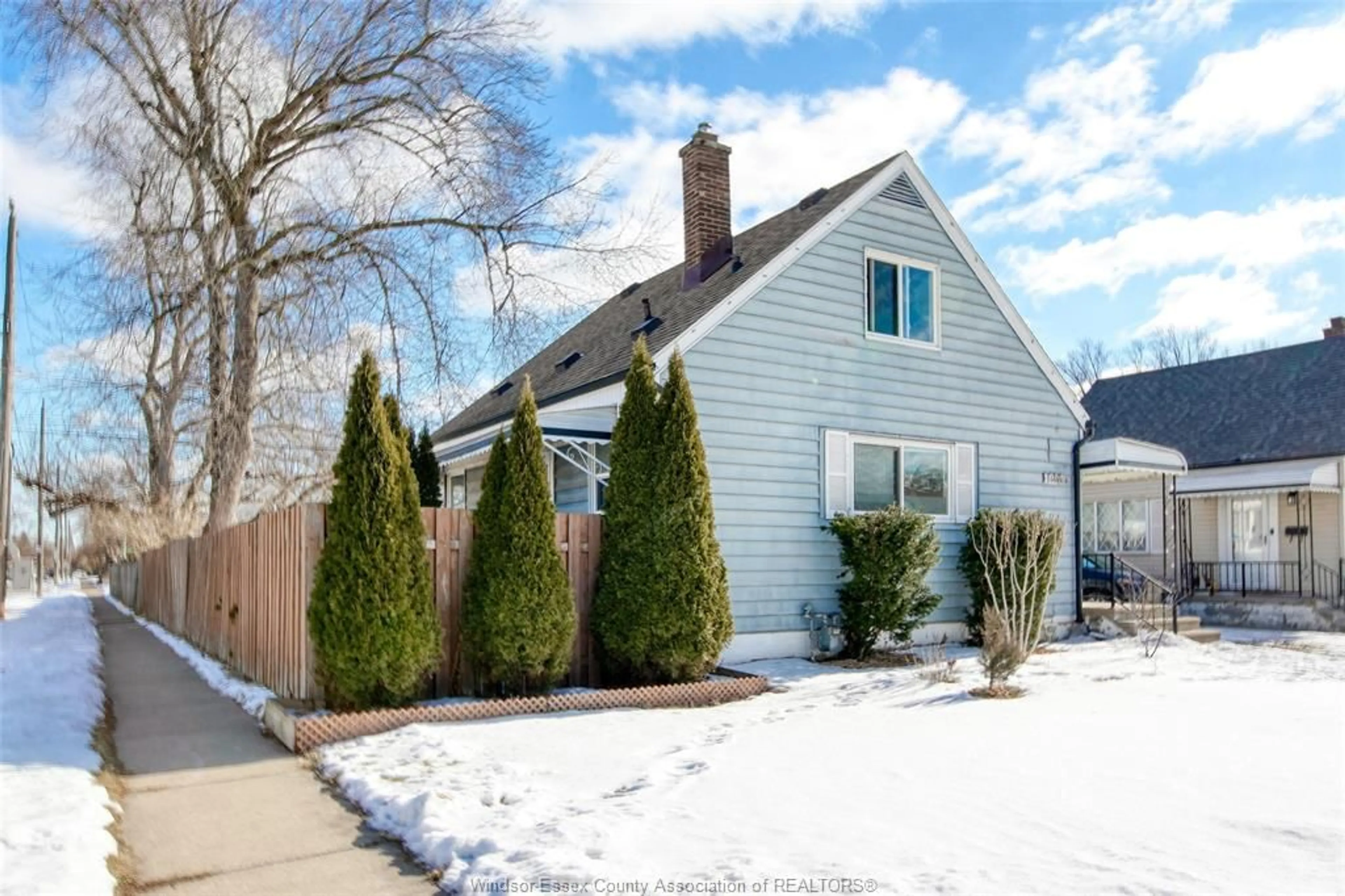 Home with vinyl exterior material, street for 1402 TOURANGEAU, Windsor Ontario N8Y 4J2