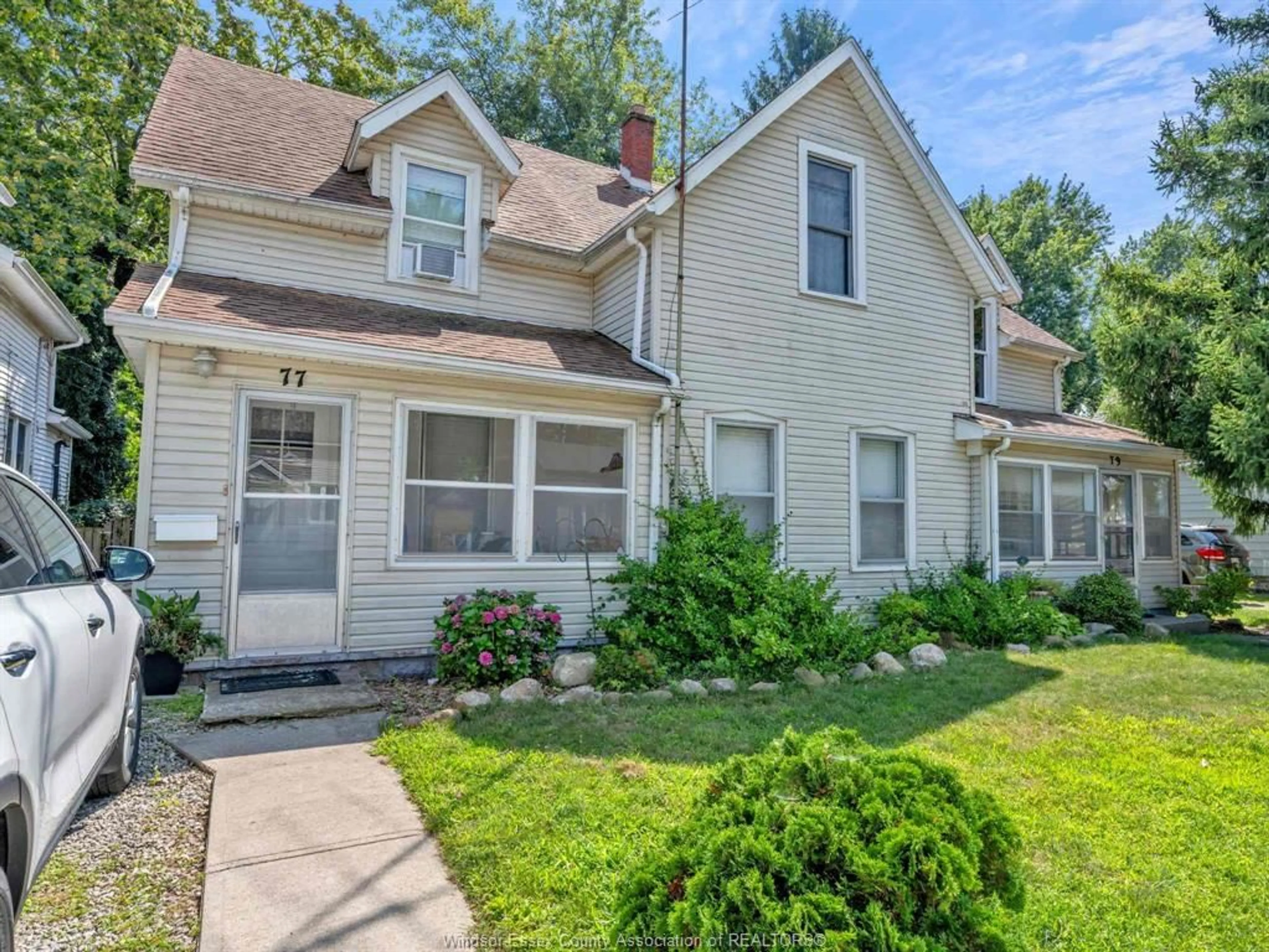 Home with vinyl exterior material, street for 77-79 Pearl St, Kingsville Ontario N9Y 1V5