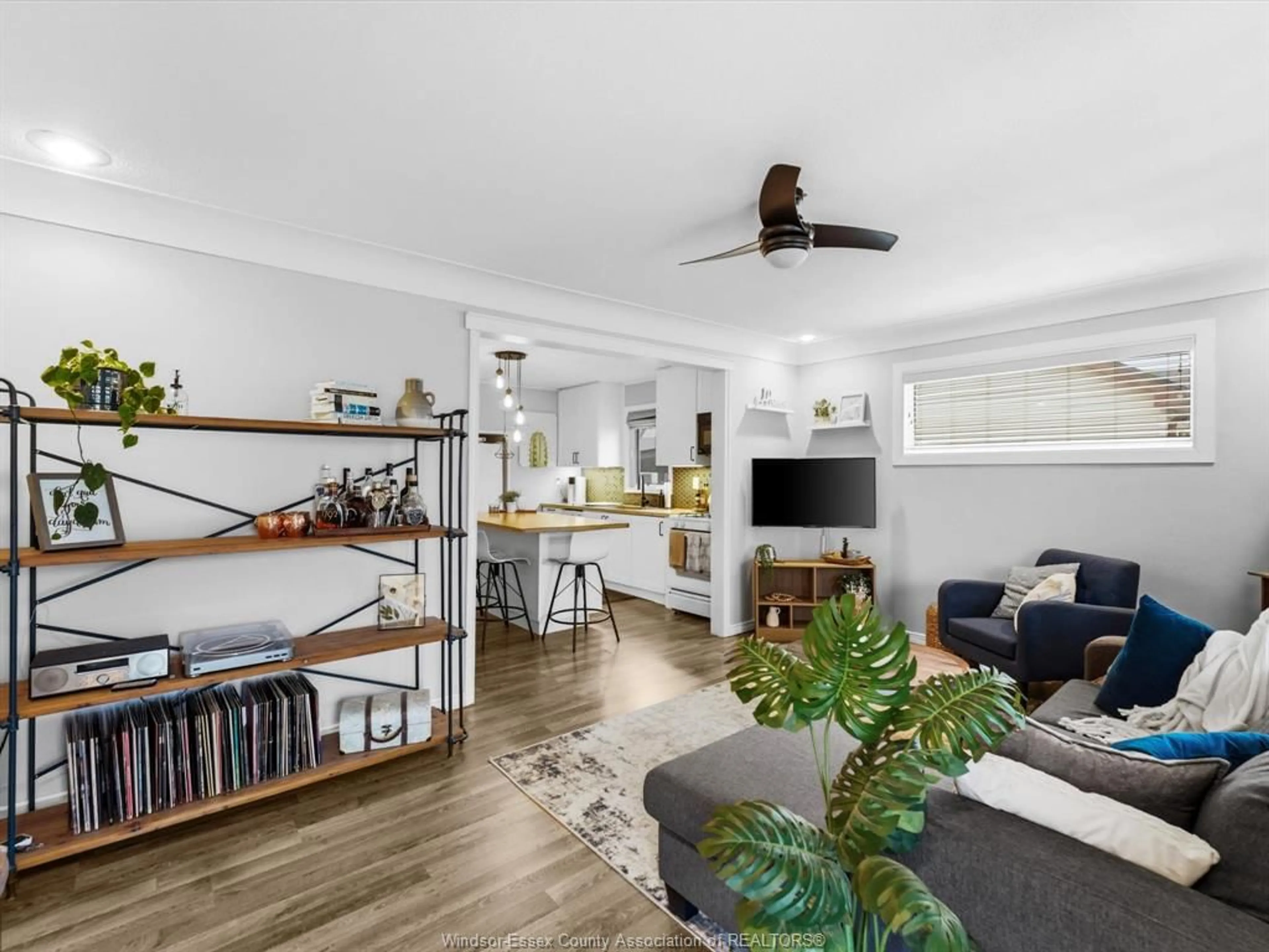 Living room with furniture, wood/laminate floor for 2666 CHANDLER, Windsor Ontario N8W 4B3