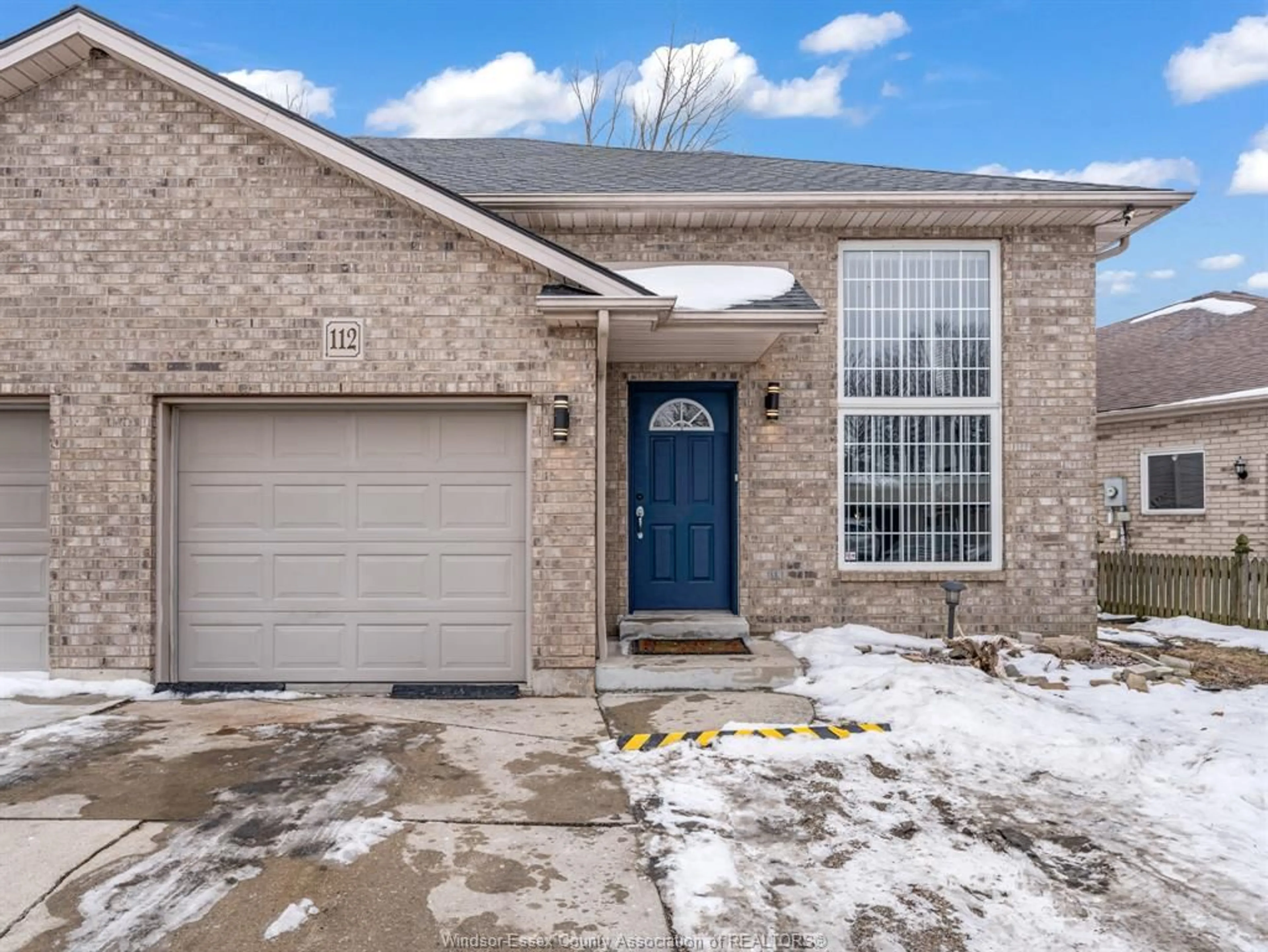 Home with brick exterior material, street for 112 SUTTON Dr, Leamington Ontario N8H 5K5