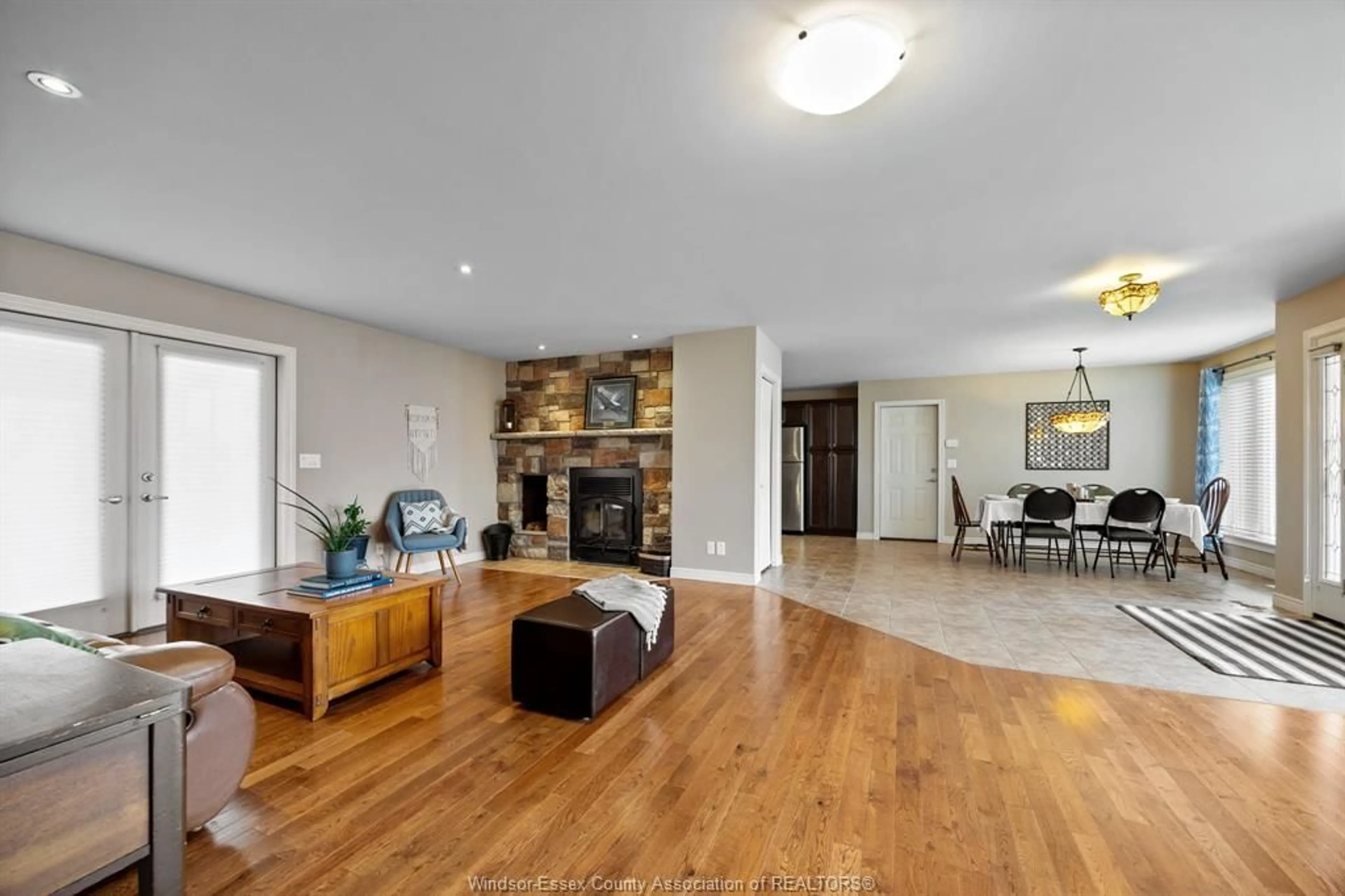 Living room with furniture, wood/laminate floor for 7530 BRODERICK, LaSalle Ontario N9H 1W8