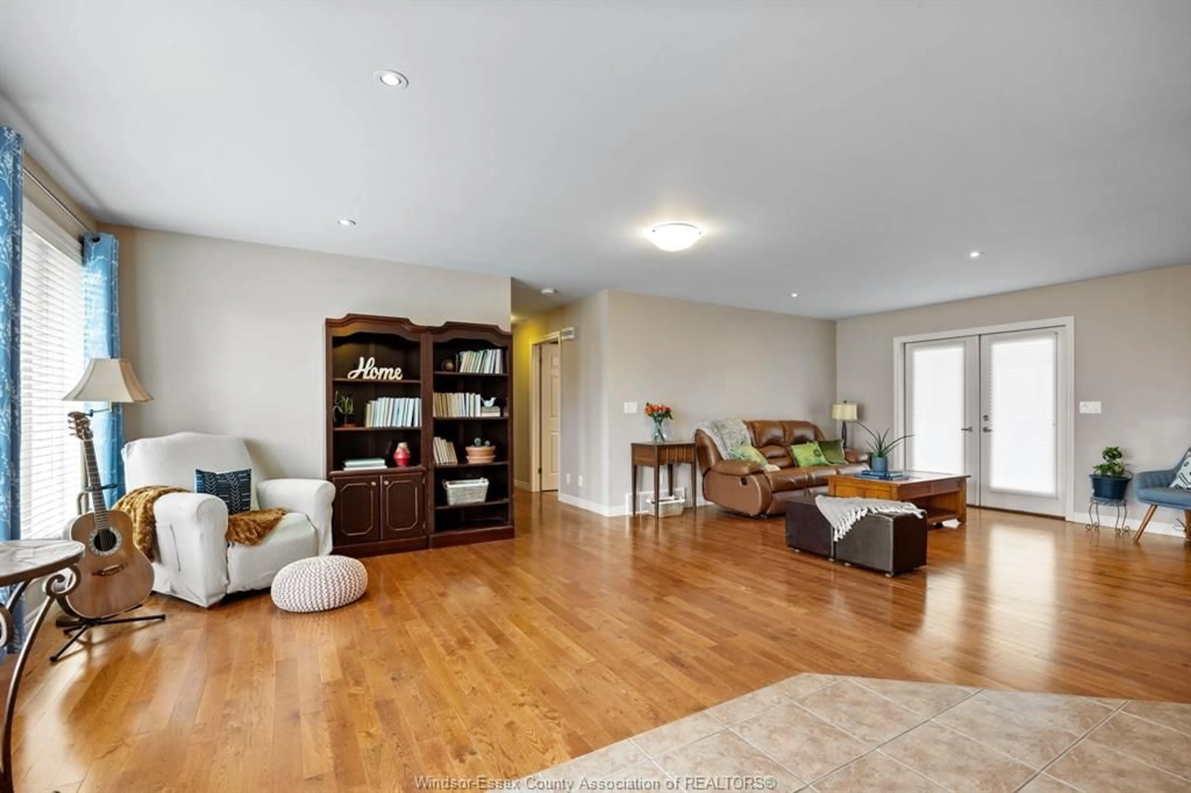 Living room with furniture, wood/laminate floor for 7530 BRODERICK, LaSalle Ontario N9H 1W8