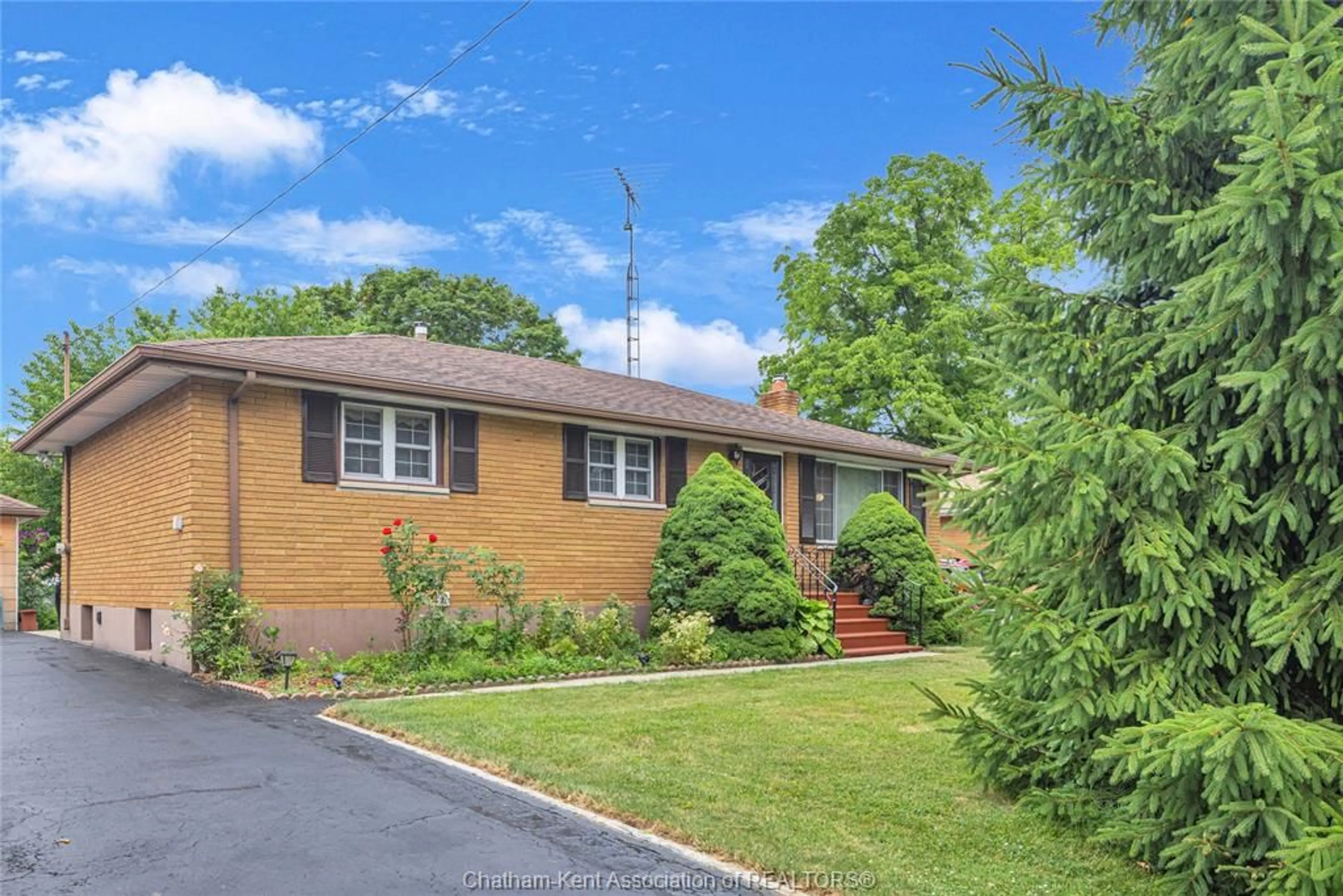 Home with brick exterior material, street for 20 Romney Rd, Chatham Ontario N7L 3S3