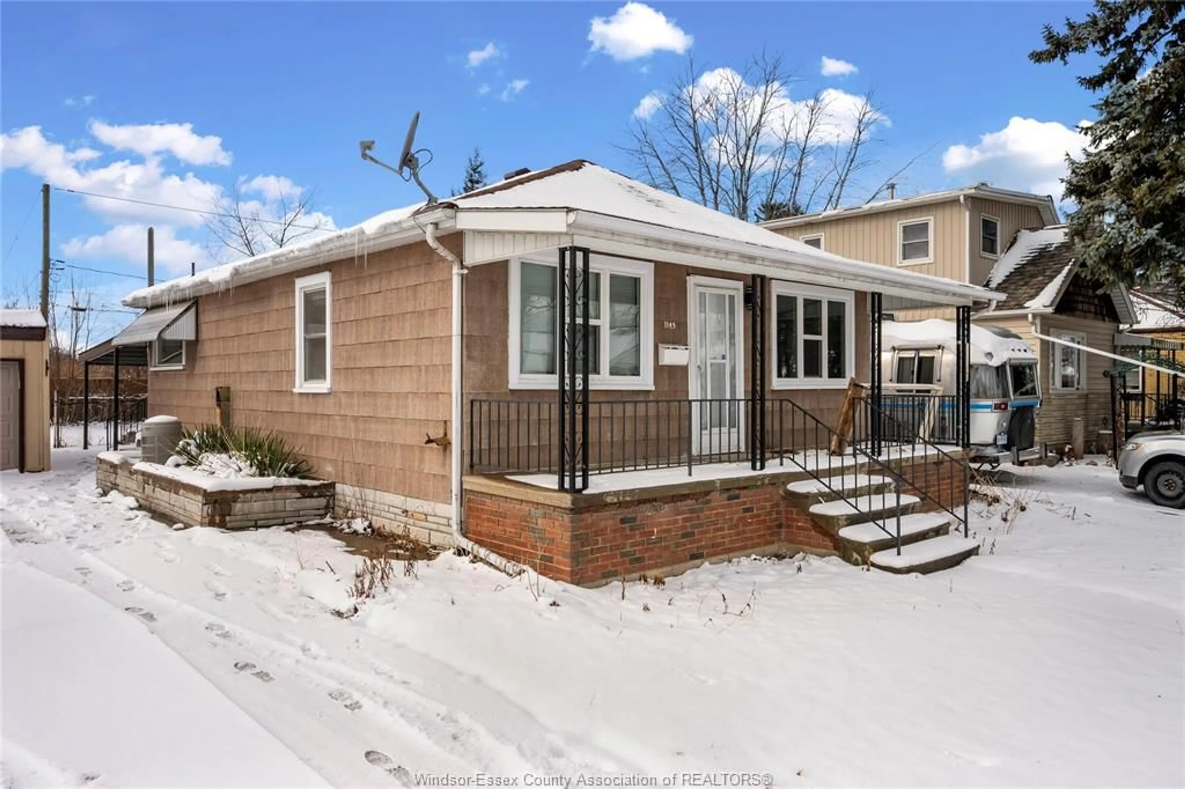 Home with vinyl exterior material, street for 1145 Ford Blvd, Windsor Ontario N8S 2G2