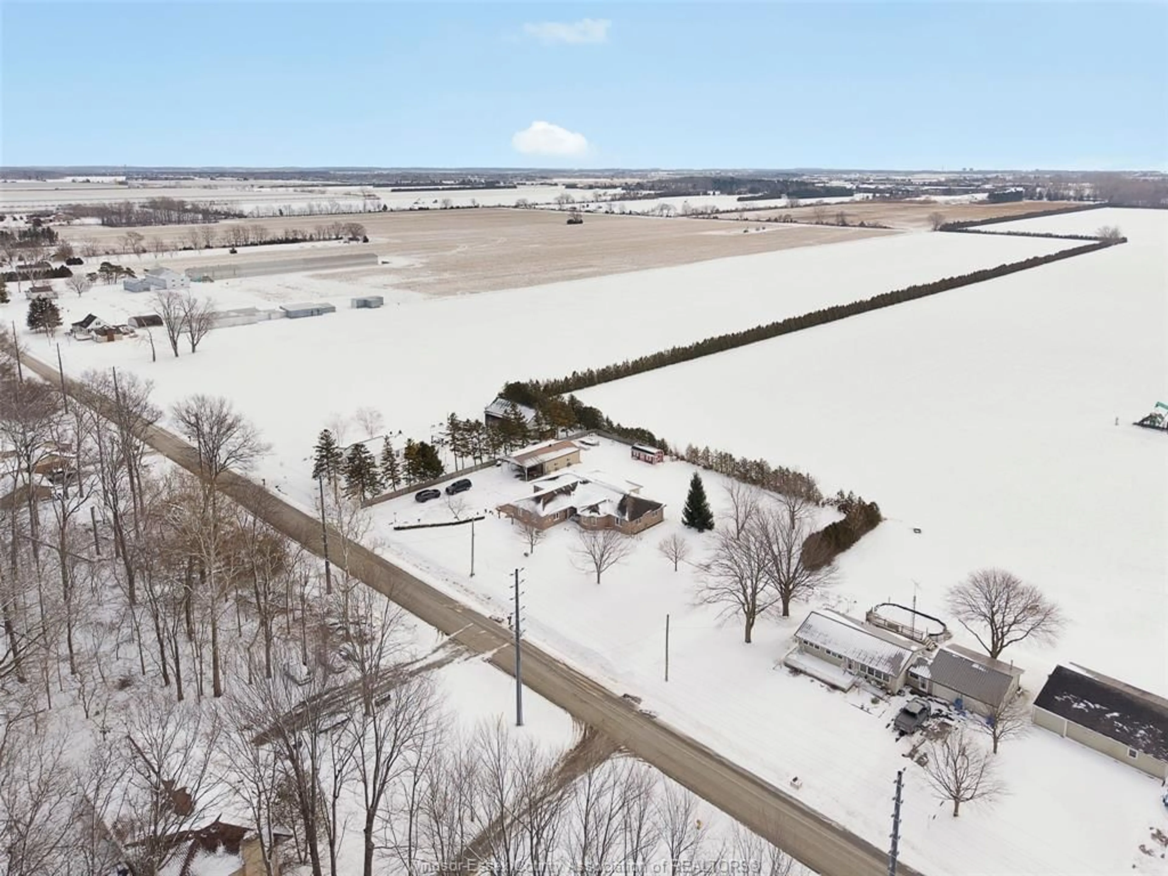 A pic from outside/outdoor area/front of a property/back of a property/a pic from drone, water/lake/river/ocean view for 224 MERSEA RD 7, Leamington Ontario N8H 3V8