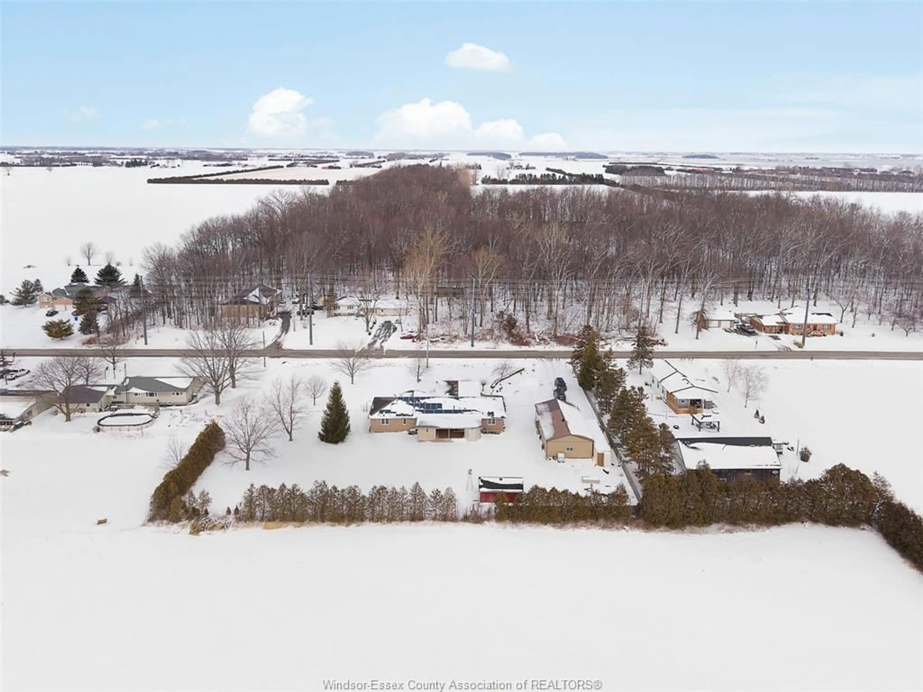 A pic from outside/outdoor area/front of a property/back of a property/a pic from drone, unknown for 224 MERSEA RD 7, Leamington Ontario N8H 3V8