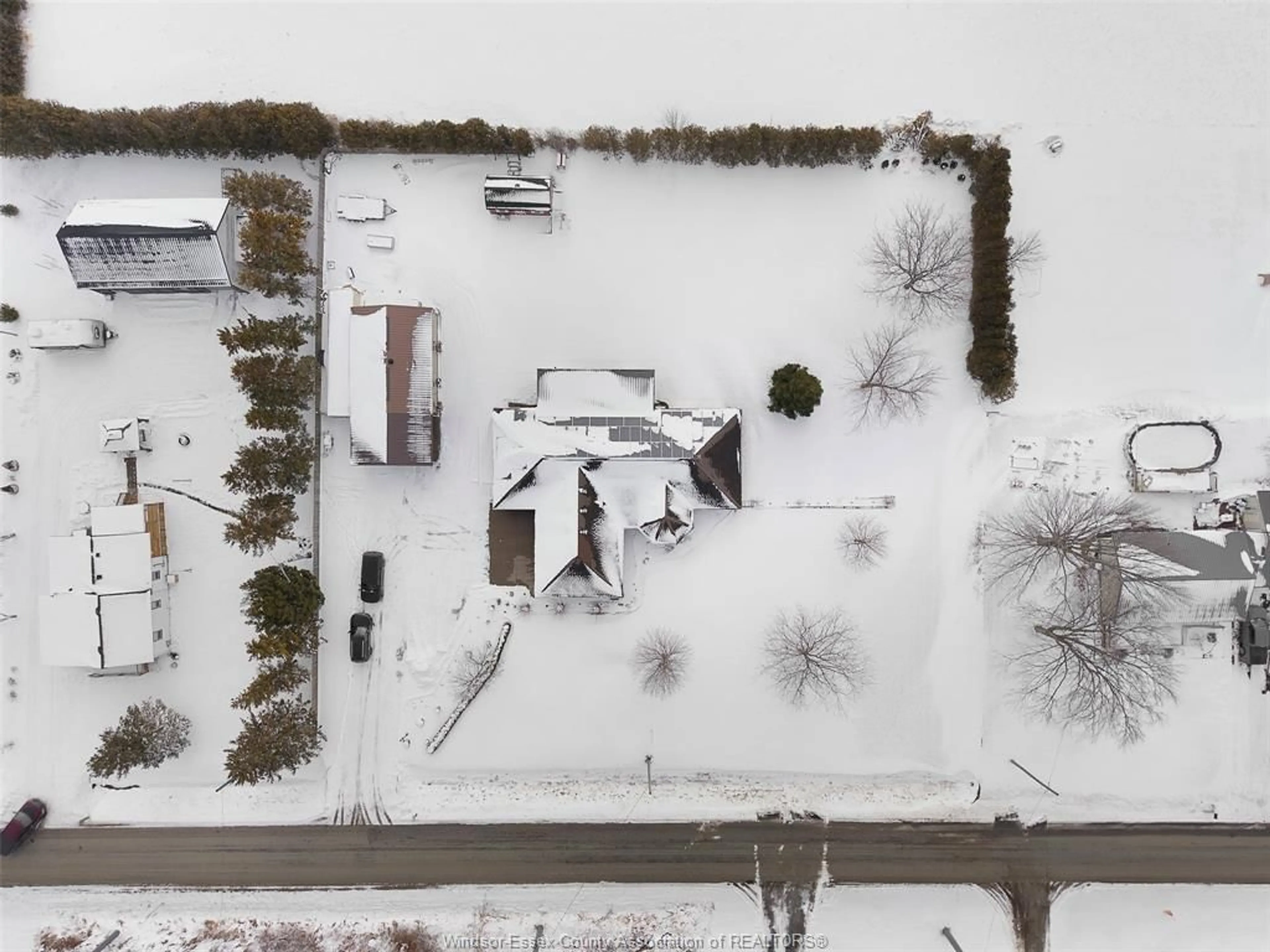 A pic from outside/outdoor area/front of a property/back of a property/a pic from drone, street for 224 MERSEA RD 7, Leamington Ontario N8H 3V8