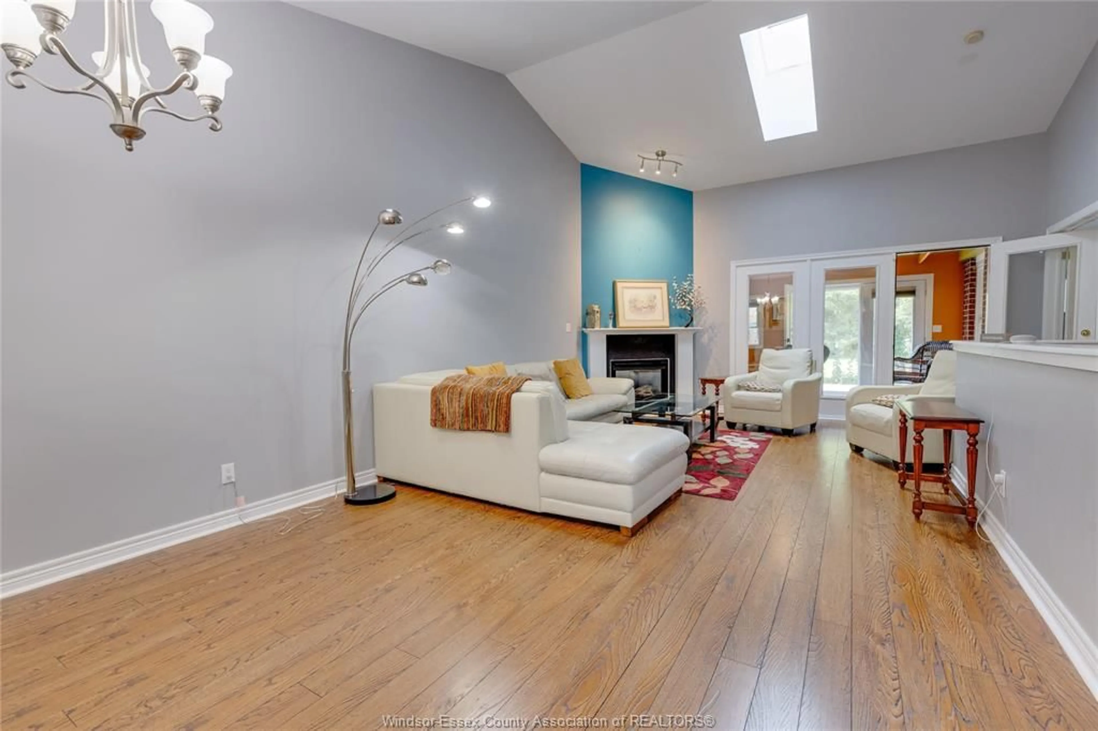 Living room with furniture, wood/laminate floor for 330 SADDLE Lane, Kingsville Ontario N9Y 4A6