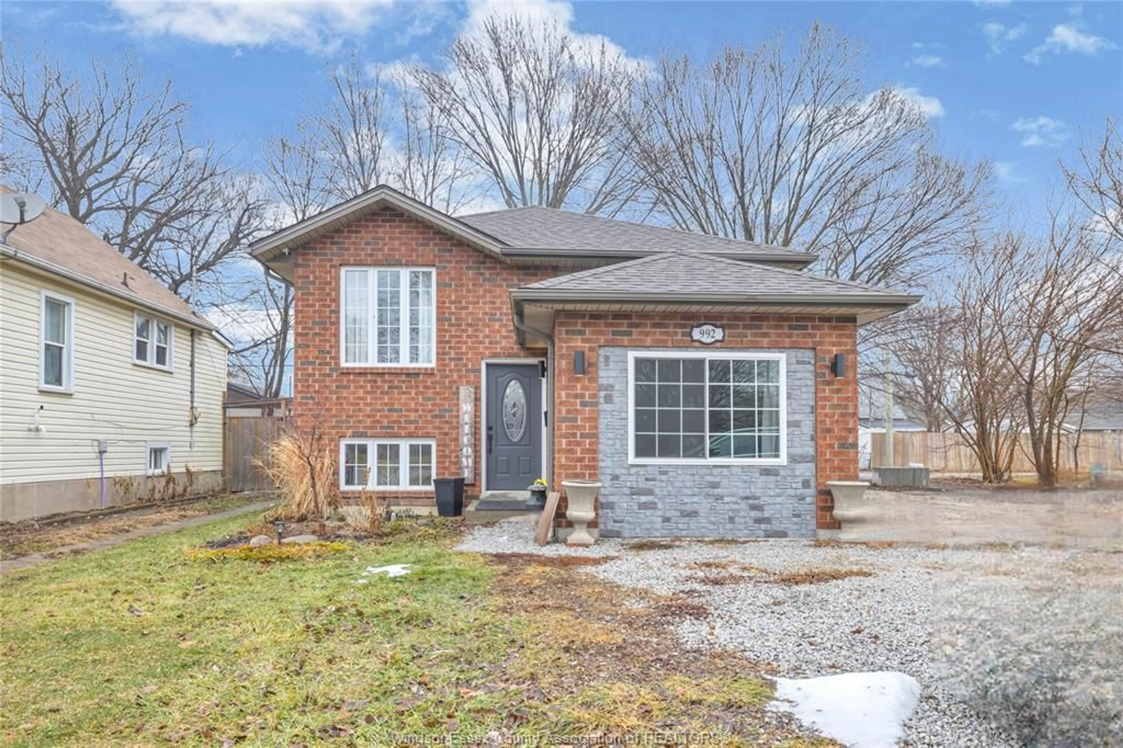 Home with brick exterior material, street for 992 Bridge Ave, Windsor Ontario N9B 2N1