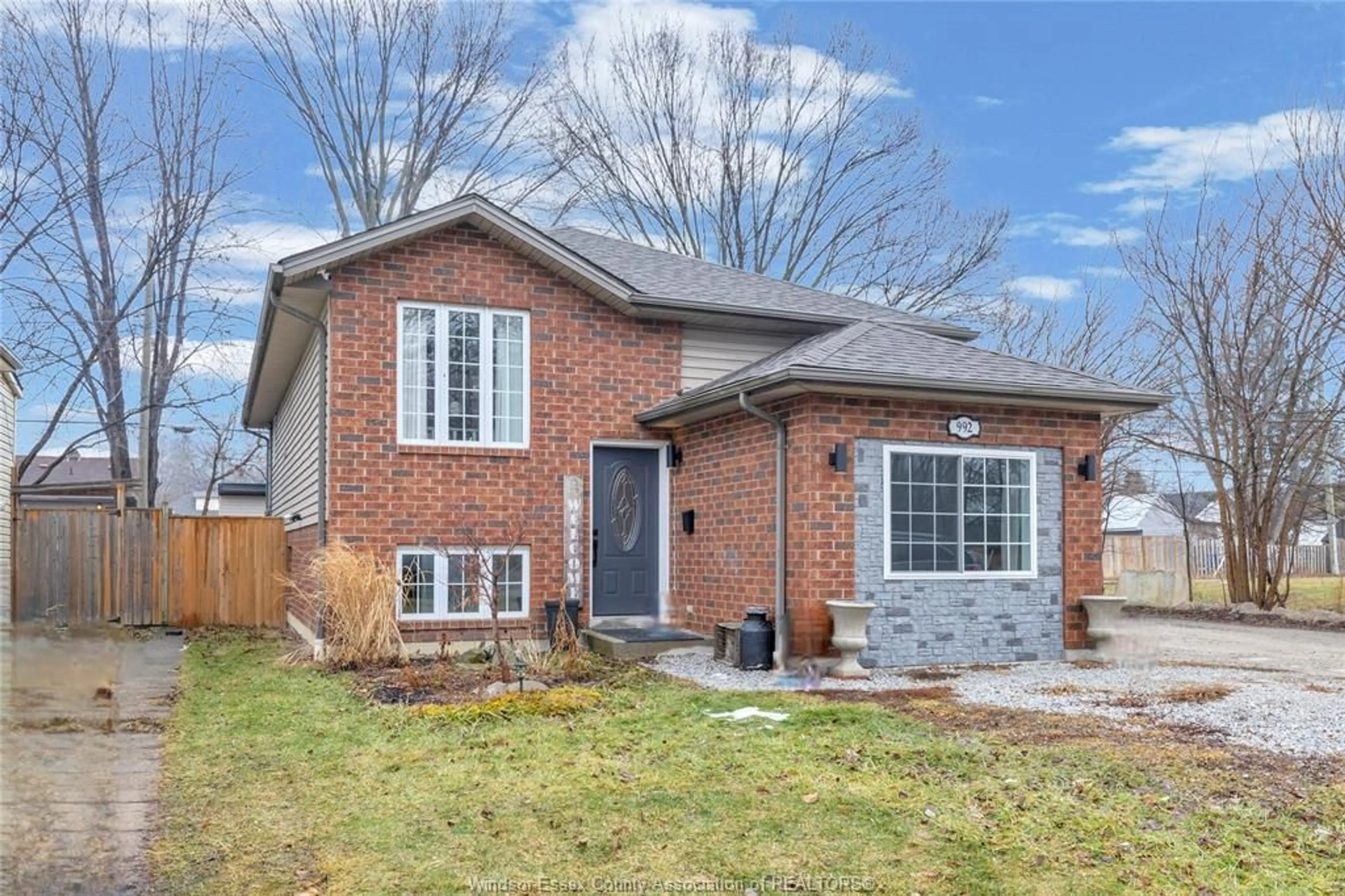 Home with brick exterior material, street for 992 Bridge Ave, Windsor Ontario N9B 2N1