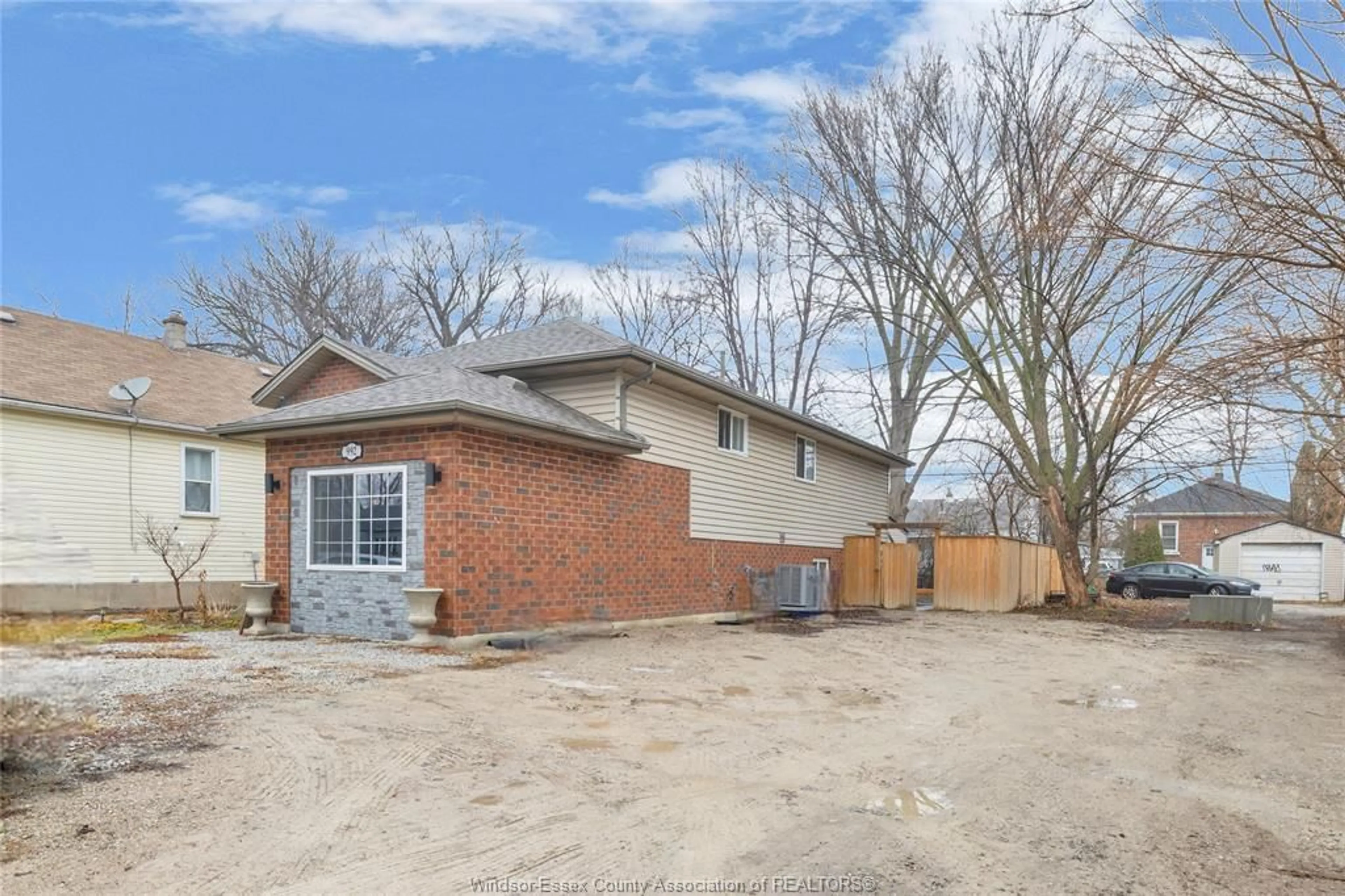 Home with brick exterior material, street for 992 Bridge Ave, Windsor Ontario N9B 2N1