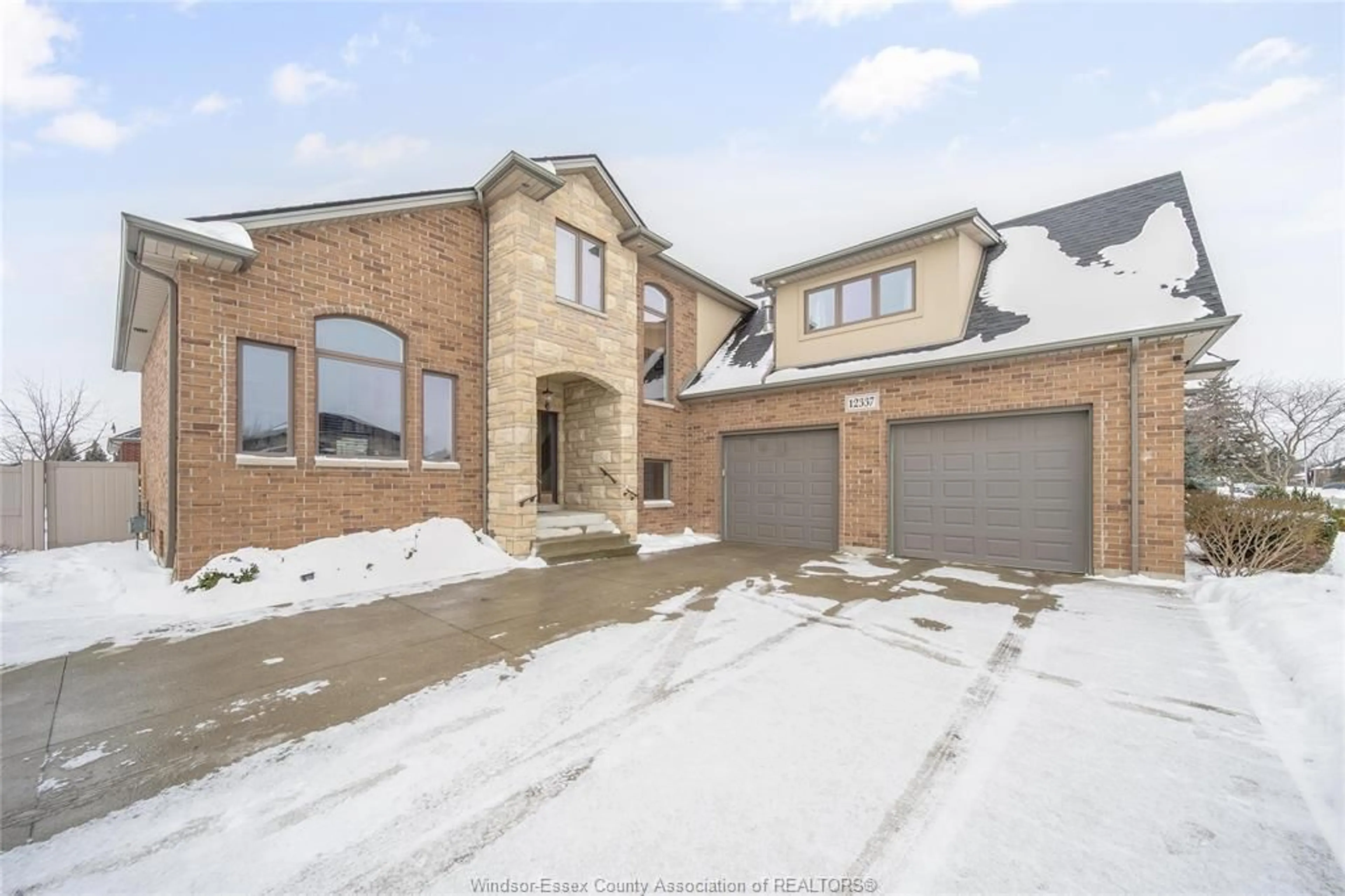 Home with brick exterior material, street for 12337 CANDLEWOOD Dr, Tecumseh Ontario N9K 0A3