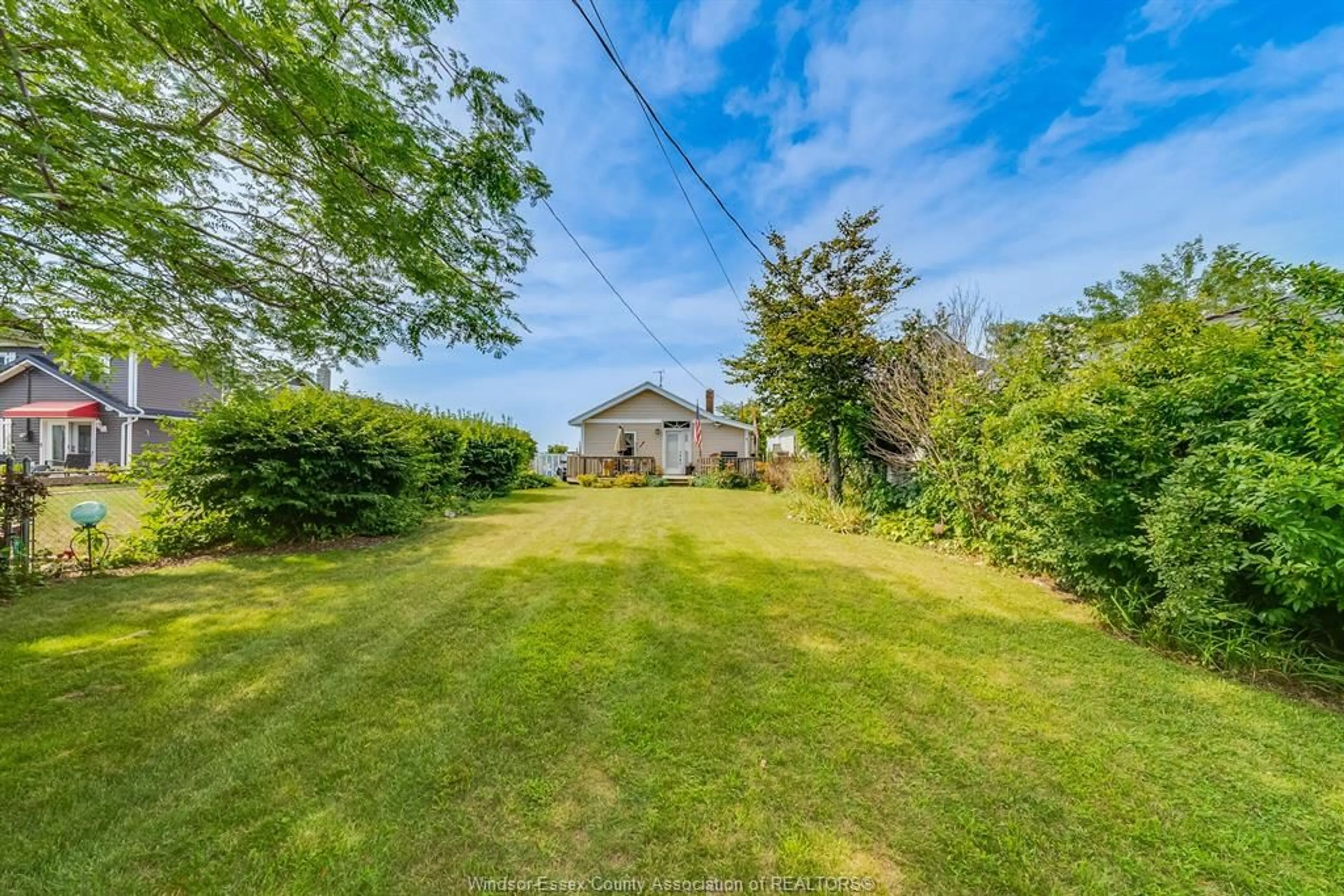 A pic from outside/outdoor area/front of a property/back of a property/a pic from drone, water/lake/river/ocean view for 499 LAKESIDE Dr, Harrow Ontario N0R 1G0