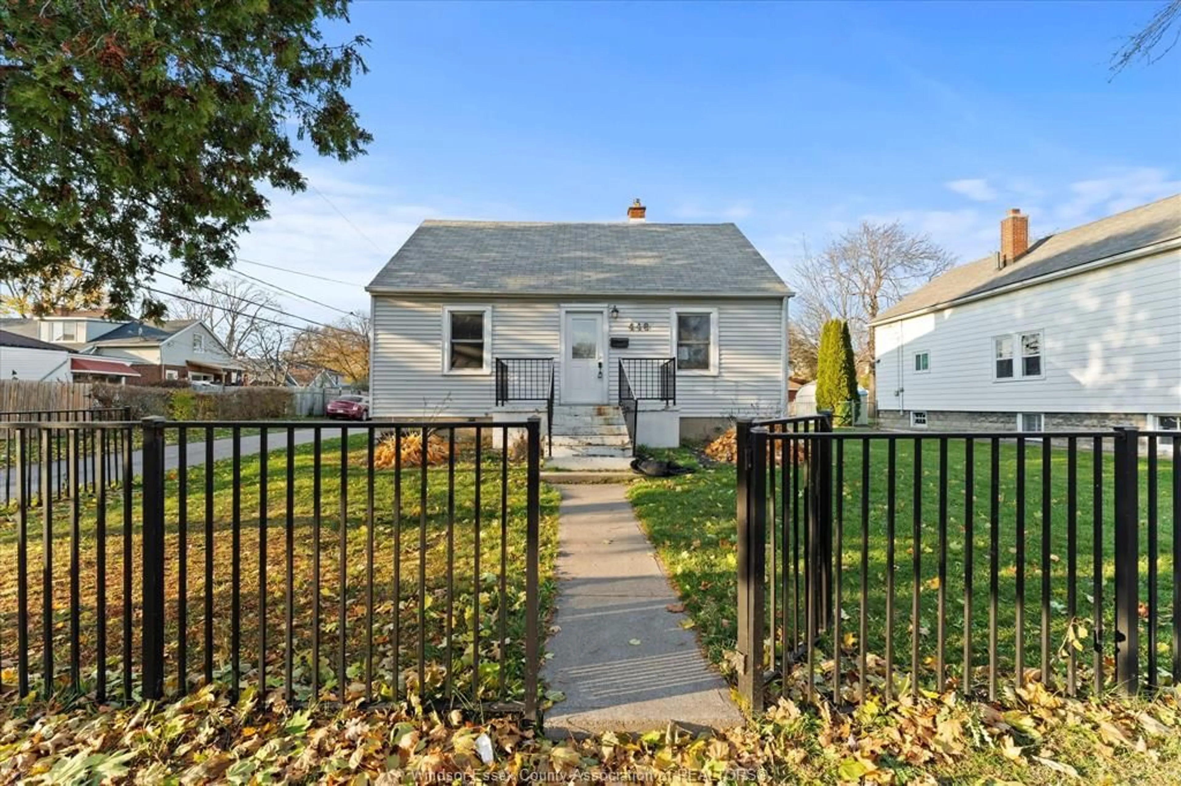 Home with vinyl exterior material, street for 448 ELLIS St, Windsor Ontario N8X 1B2