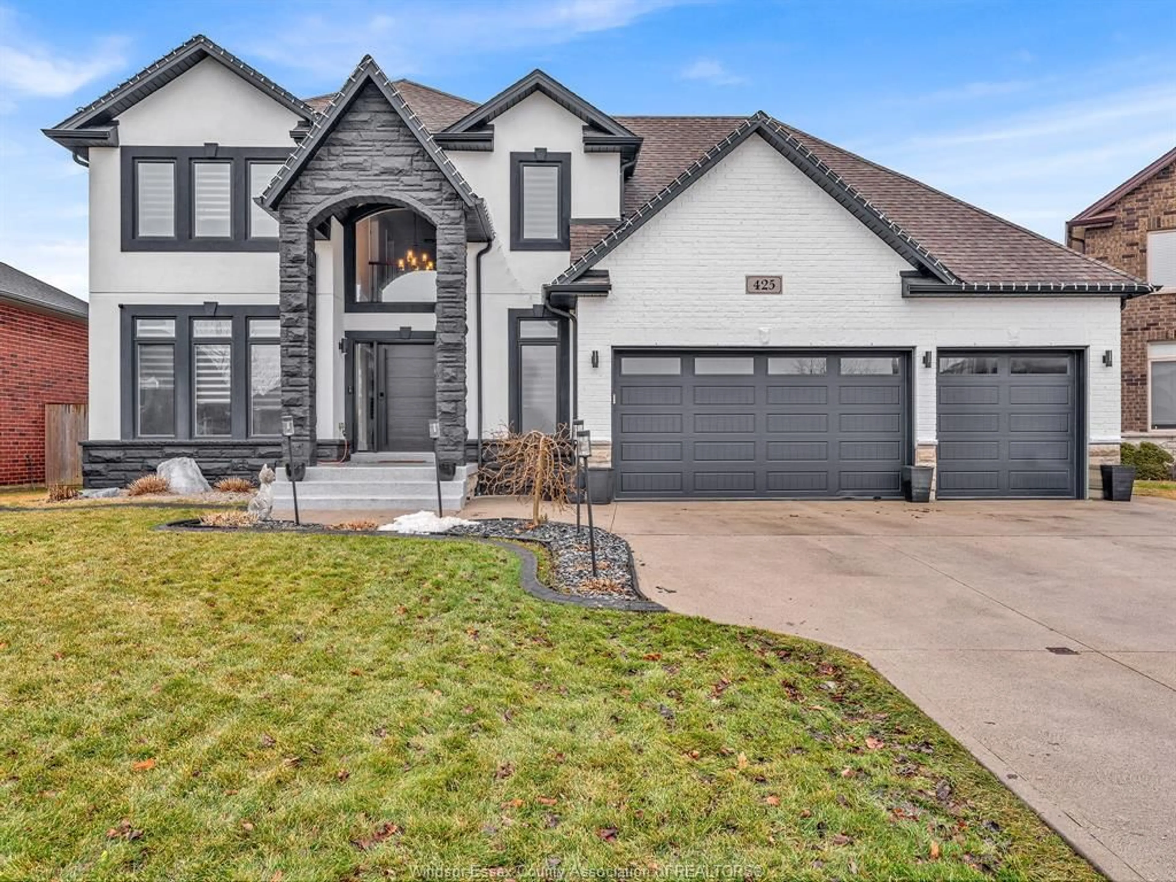 Home with brick exterior material, street for 425 PINEHURST, Lakeshore Ontario N8L 0X4