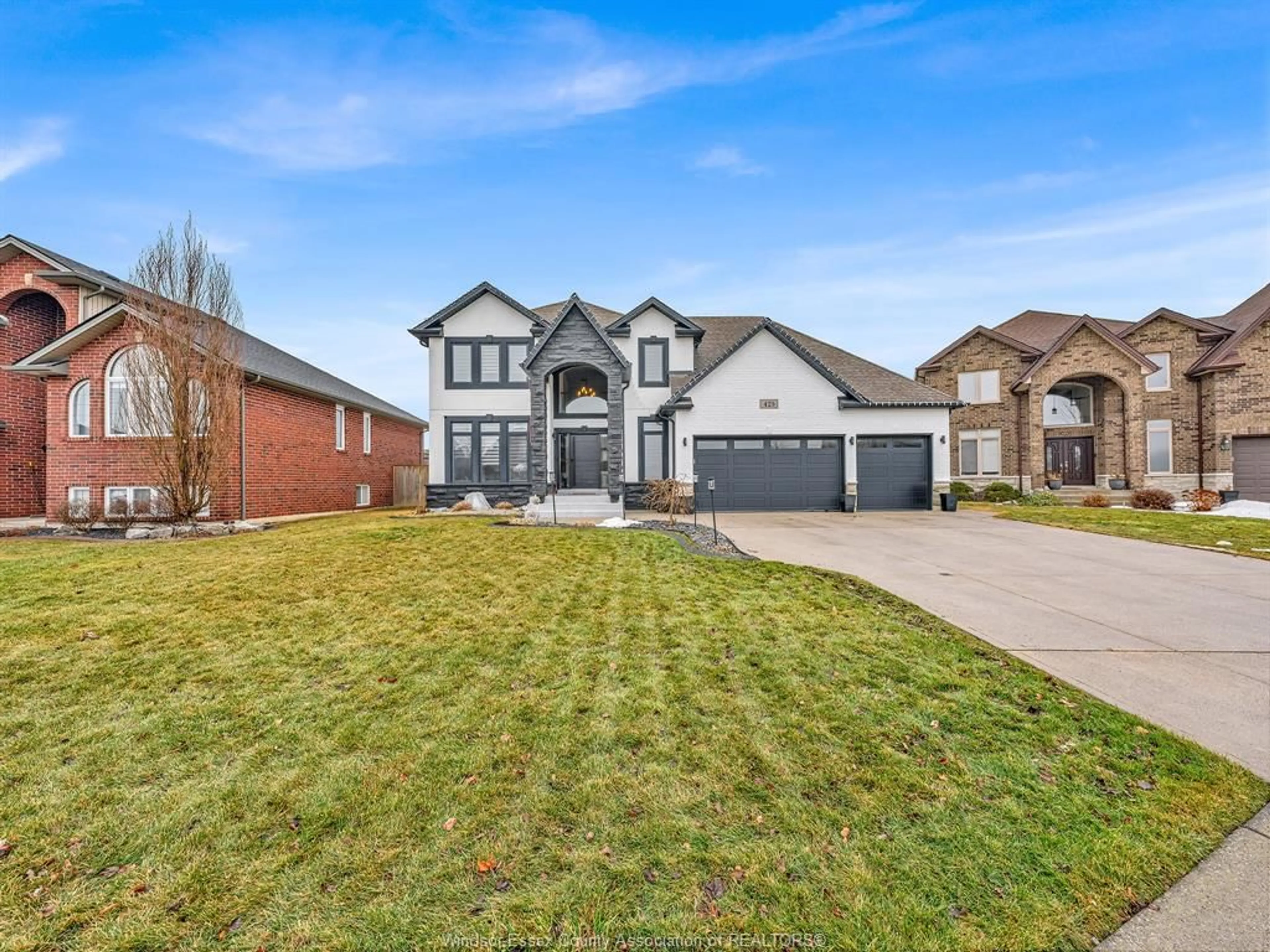 Home with brick exterior material, street for 425 PINEHURST, Lakeshore Ontario N8L 0X4