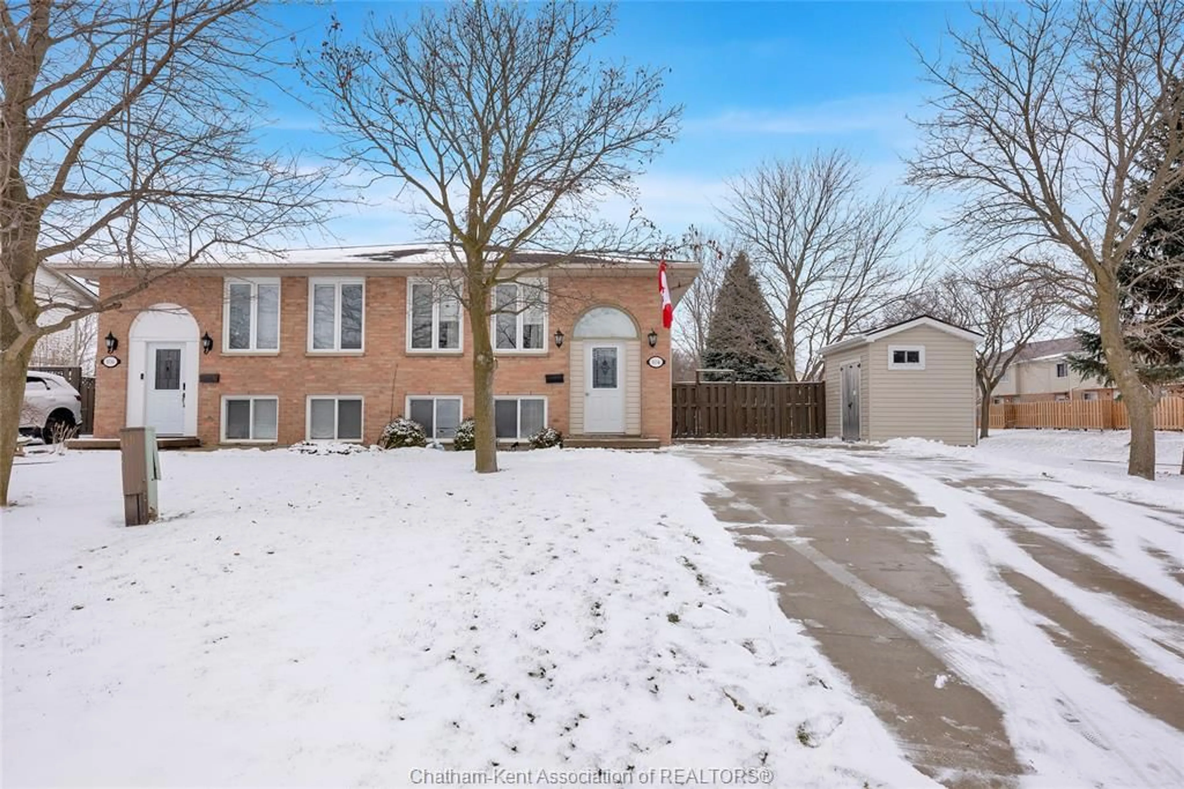 A pic from outside/outdoor area/front of a property/back of a property/a pic from drone, street for 104 Bruinsma Ave, Wallaceburg Ontario N8A 5G8