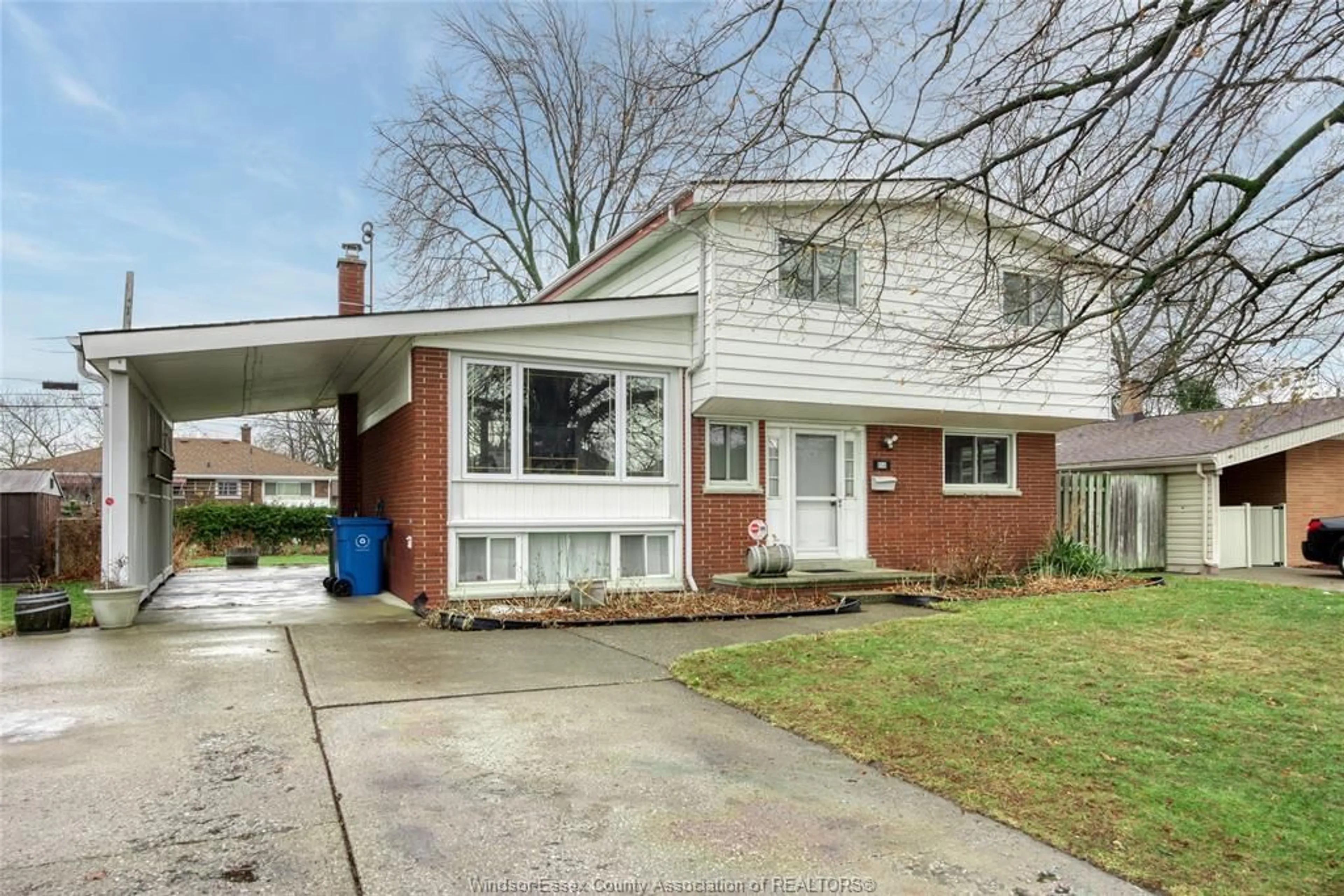 Home with brick exterior material, street for 856 WESTCHESTER Dr, Windsor Ontario N8S 3Y7