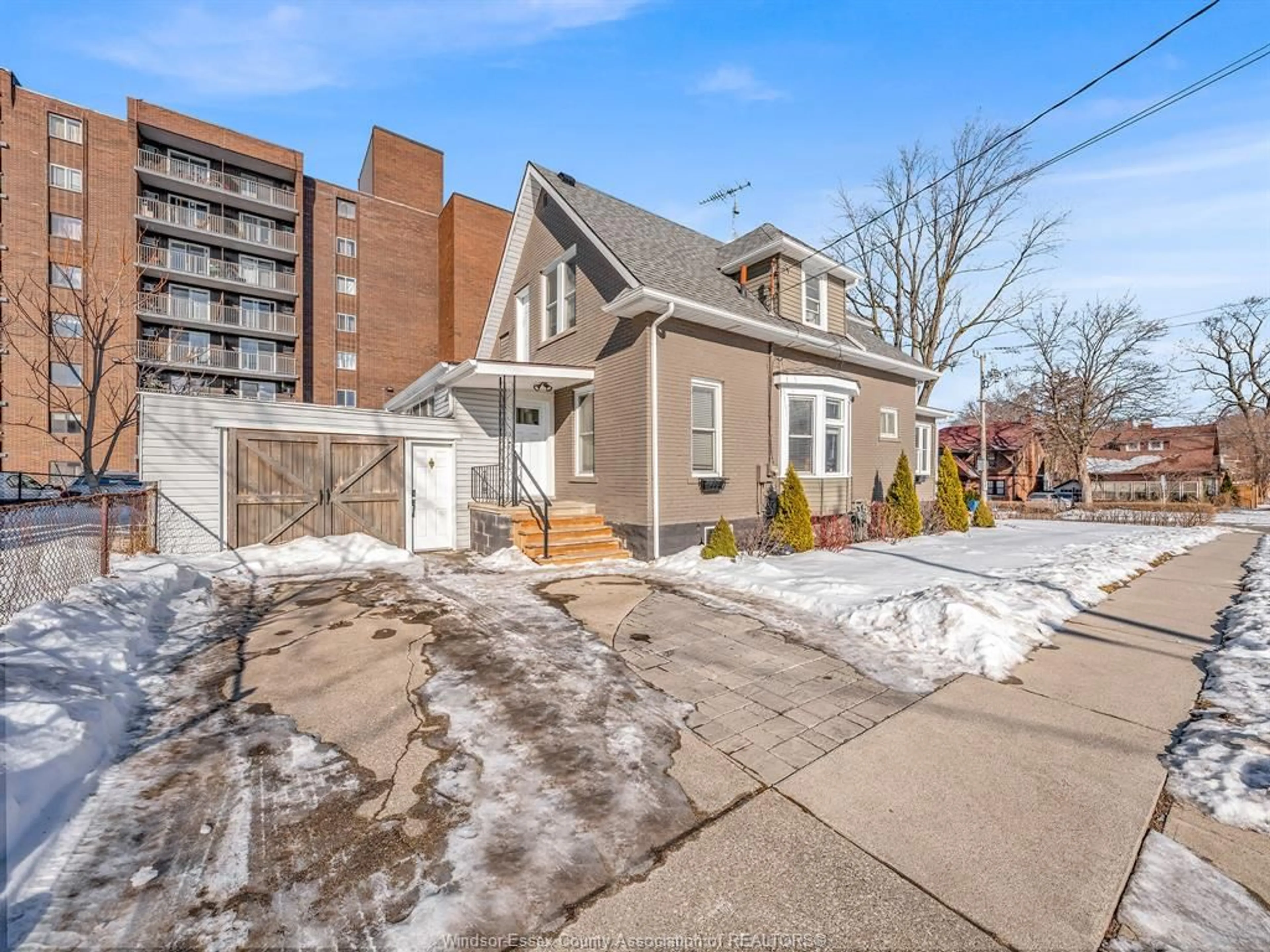 Home with brick exterior material, street for 393 DETROIT St, Windsor Ontario N9C 2P4