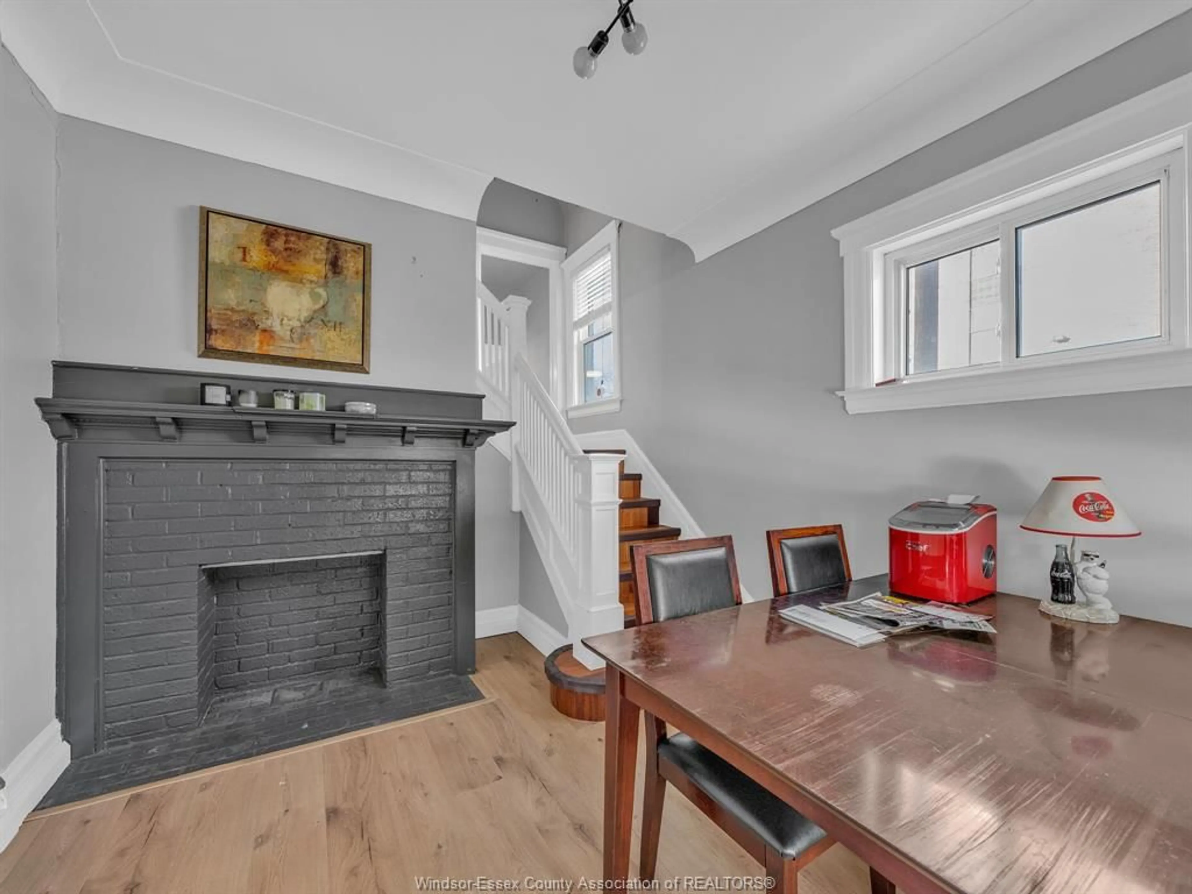 Dining room, wood/laminate floor for 393 DETROIT St, Windsor Ontario N9C 2P4