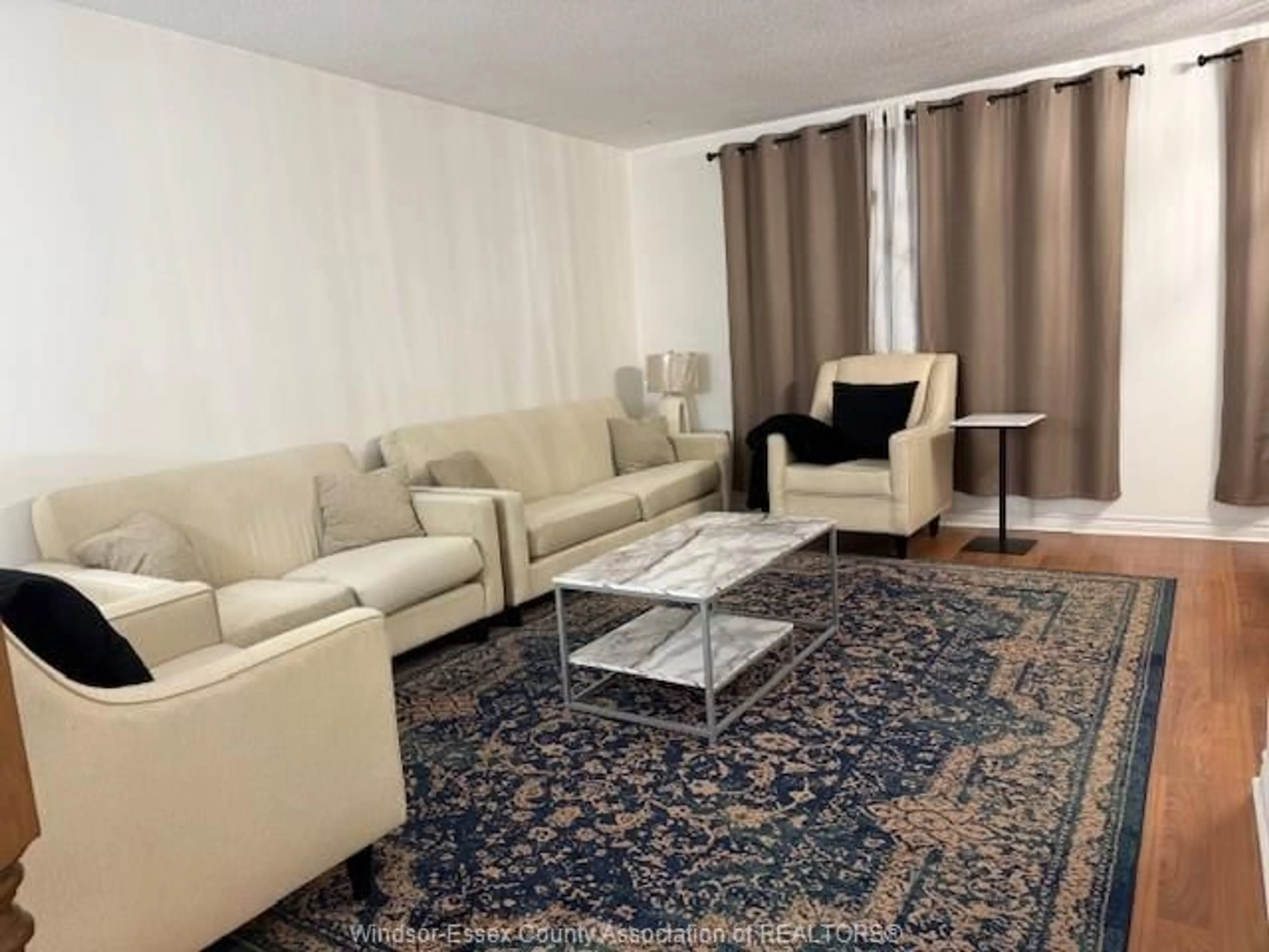 Living room with furniture, carpet floor for 816 DAWSON Rd, Windsor Ontario N8Y 4A2