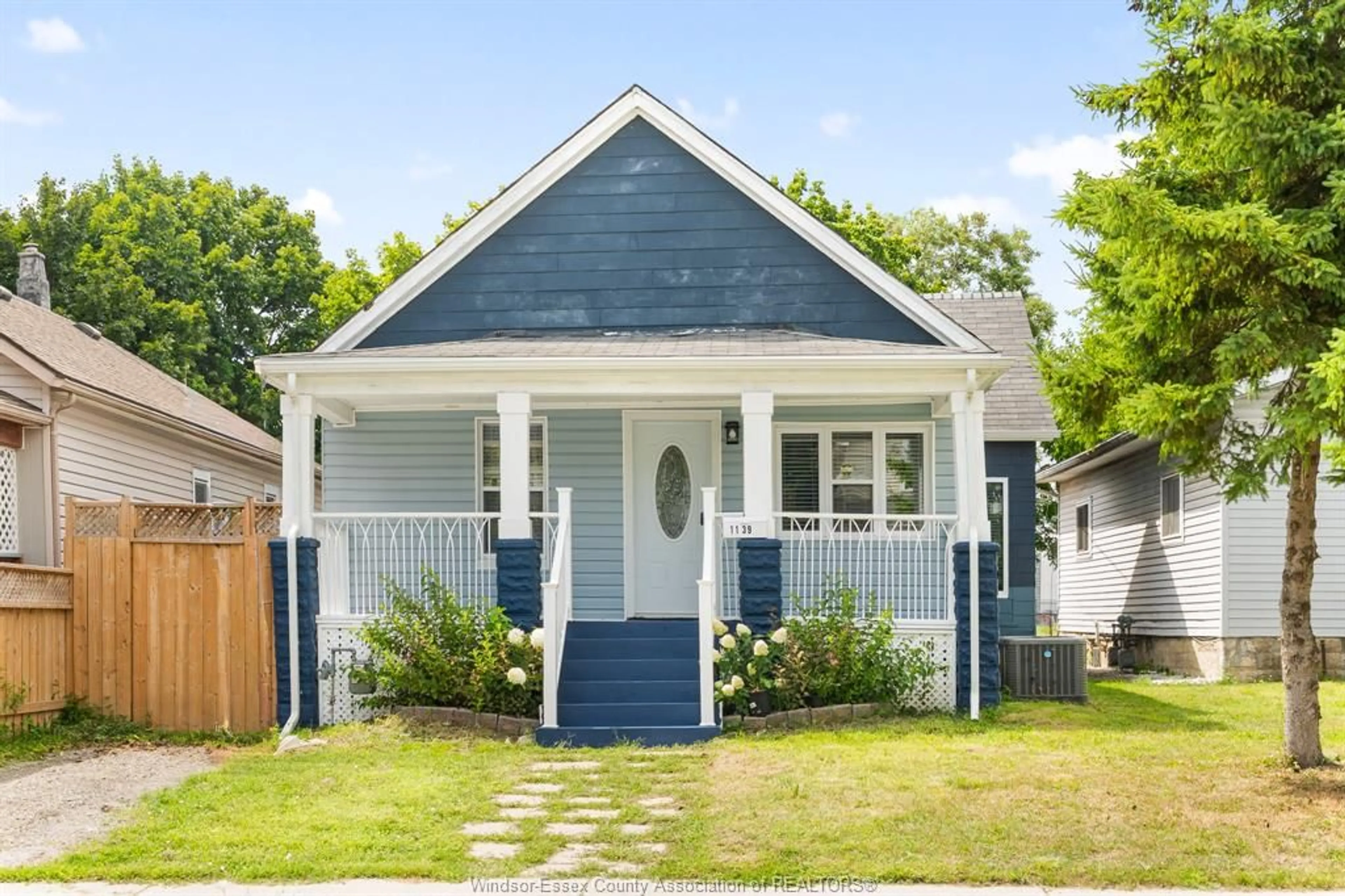 Home with vinyl exterior material, street for 1139 WELLINGTON, Windsor Ontario N9A 5K2