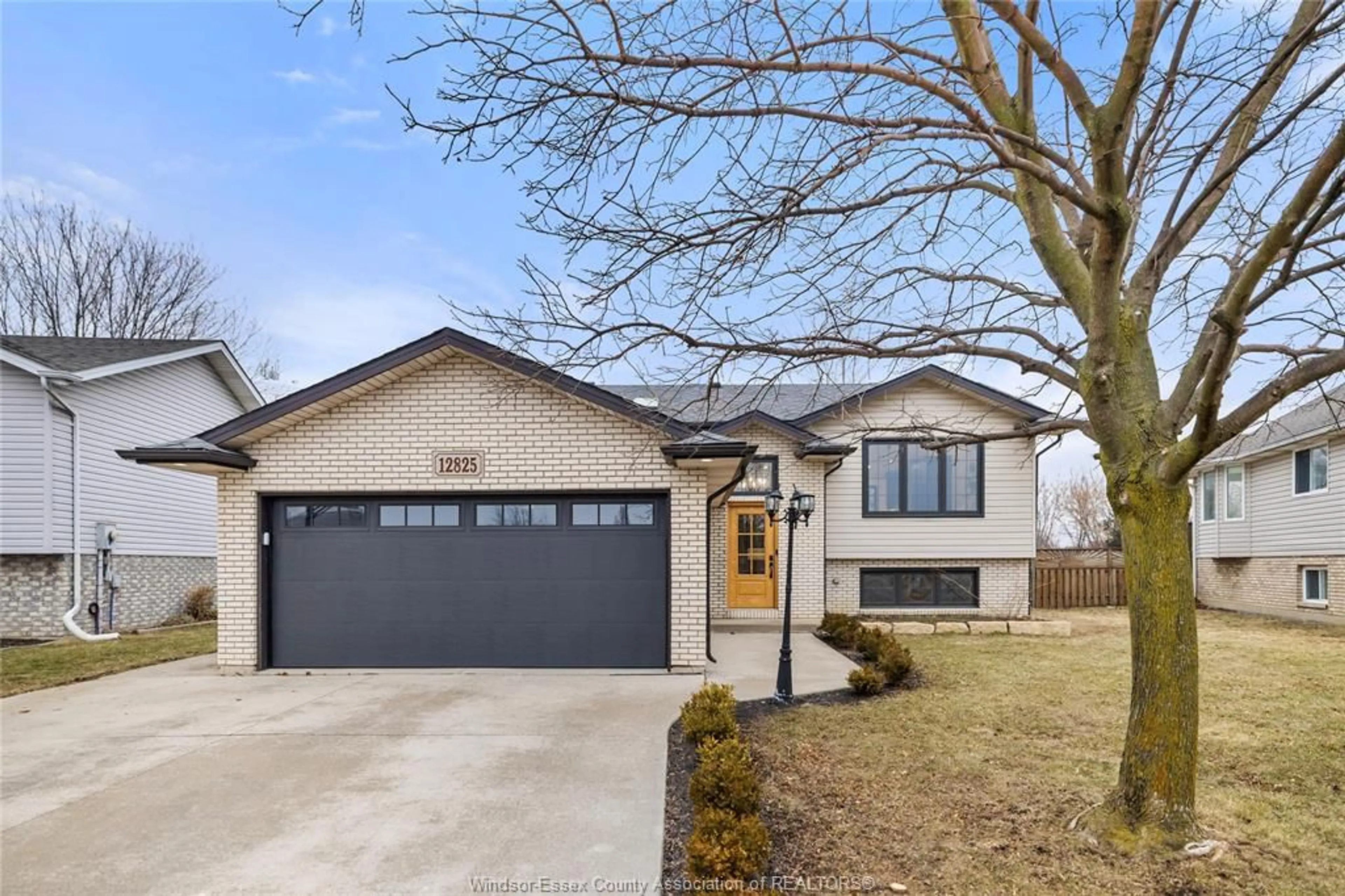 Home with brick exterior material, street for 12825 Lemire St, Tecumseh Ontario N8N 4W1