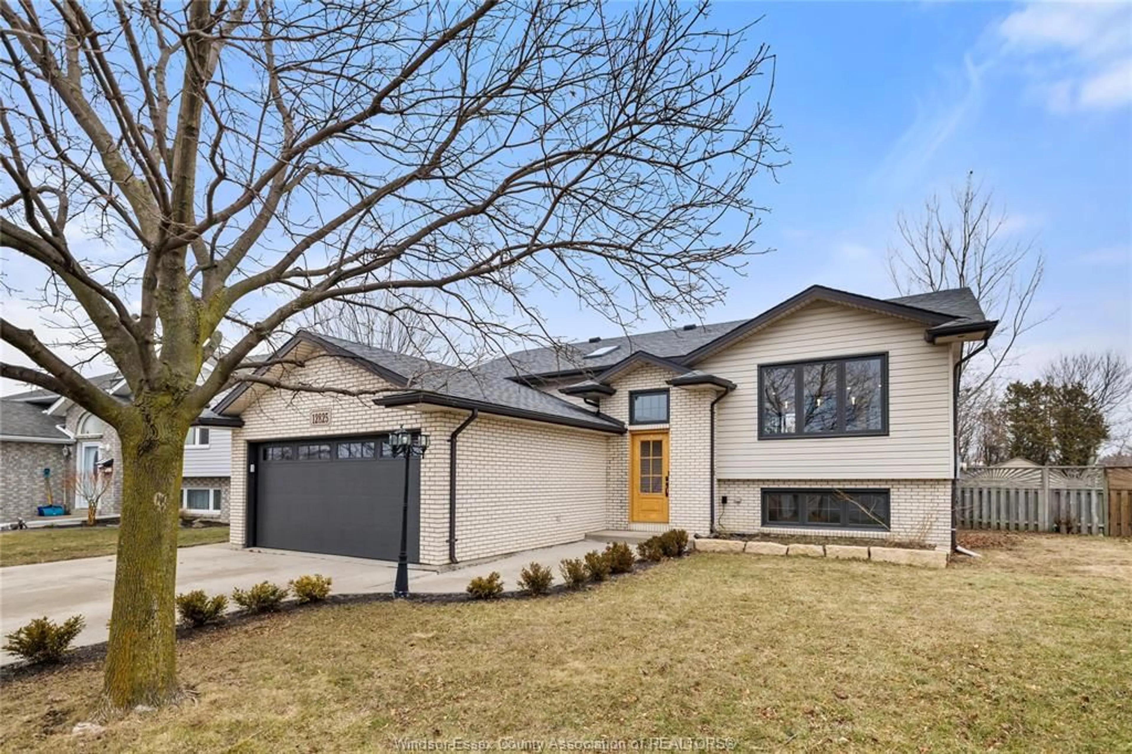 Home with brick exterior material, street for 12825 Lemire St, Tecumseh Ontario N8N 4W1