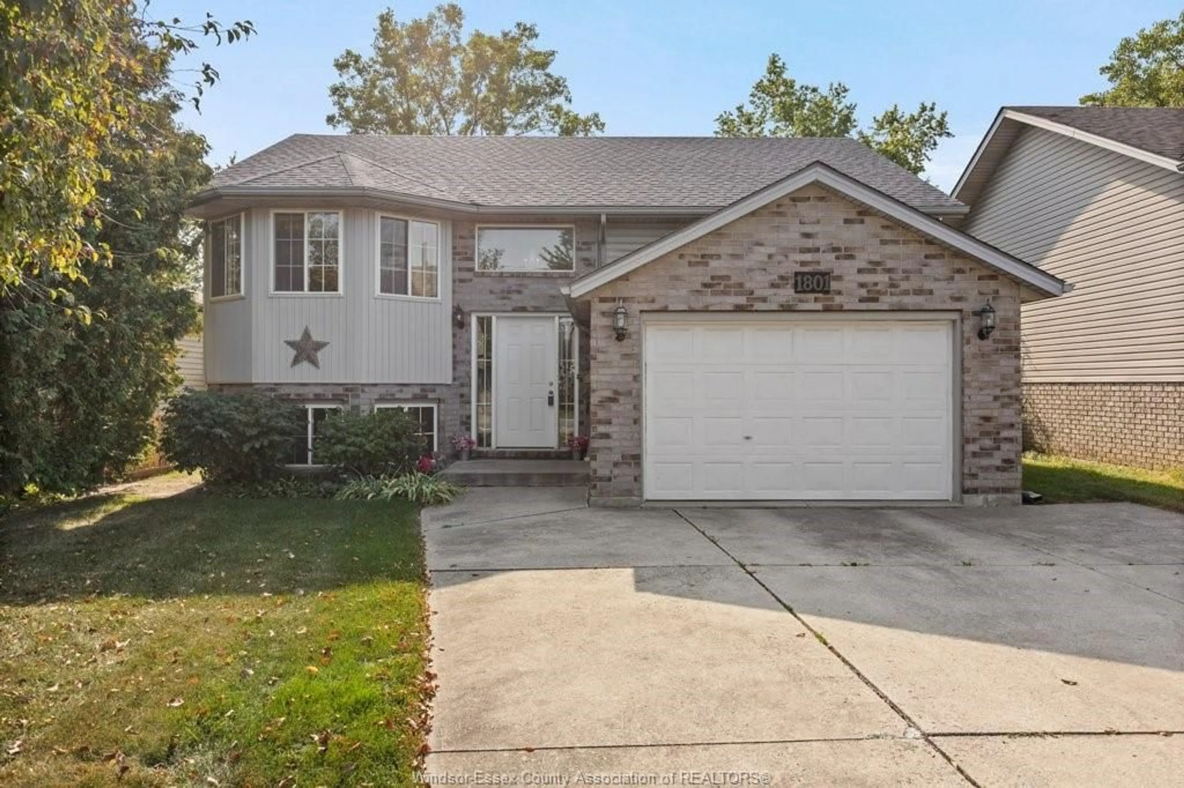 Home with brick exterior material, street for 1801 DOMINION, Windsor Ontario N9B 3H8