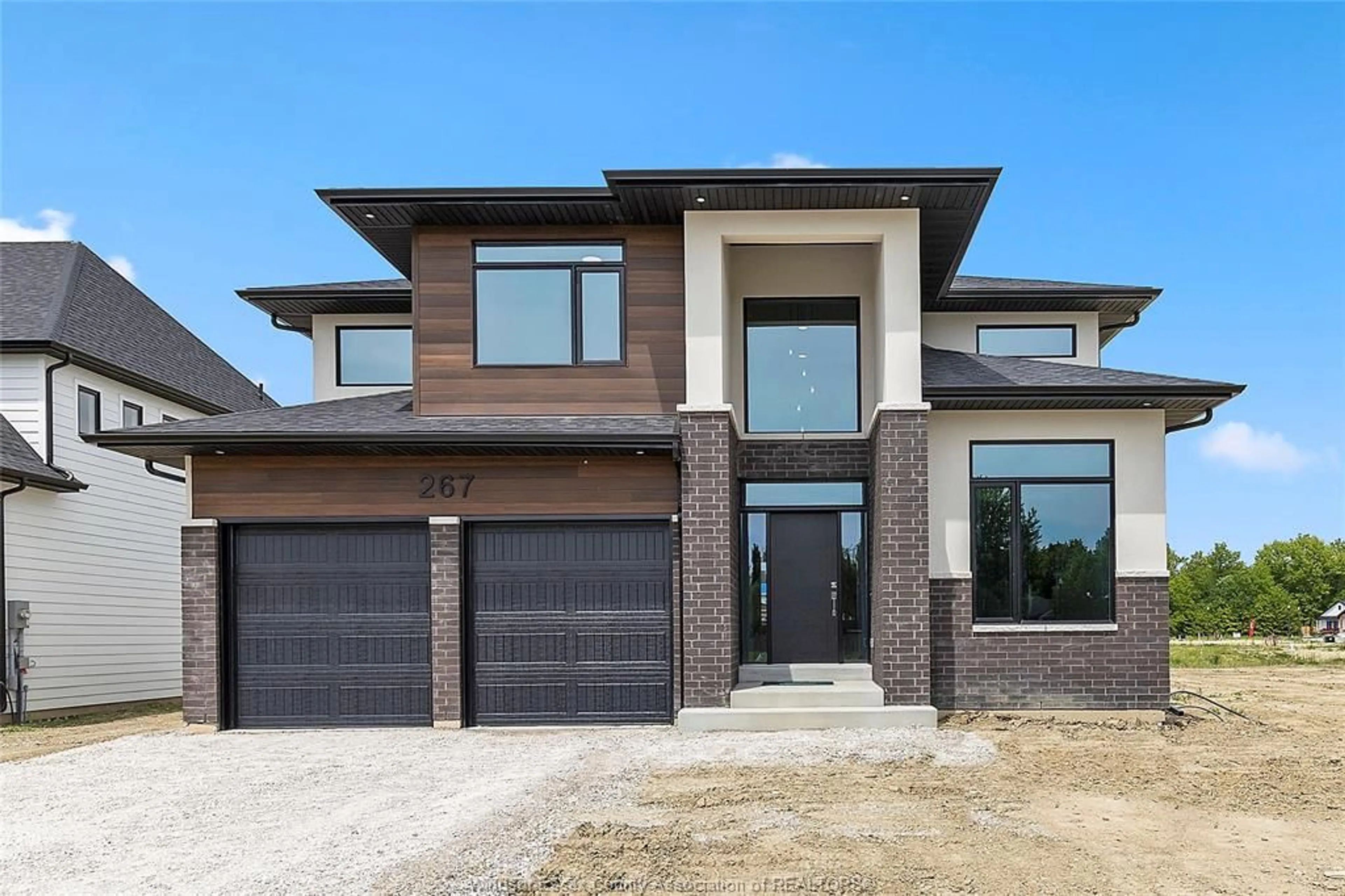 Home with brick exterior material, street for 267 JOAN FLOOD, Essex Ontario N8M 3E9