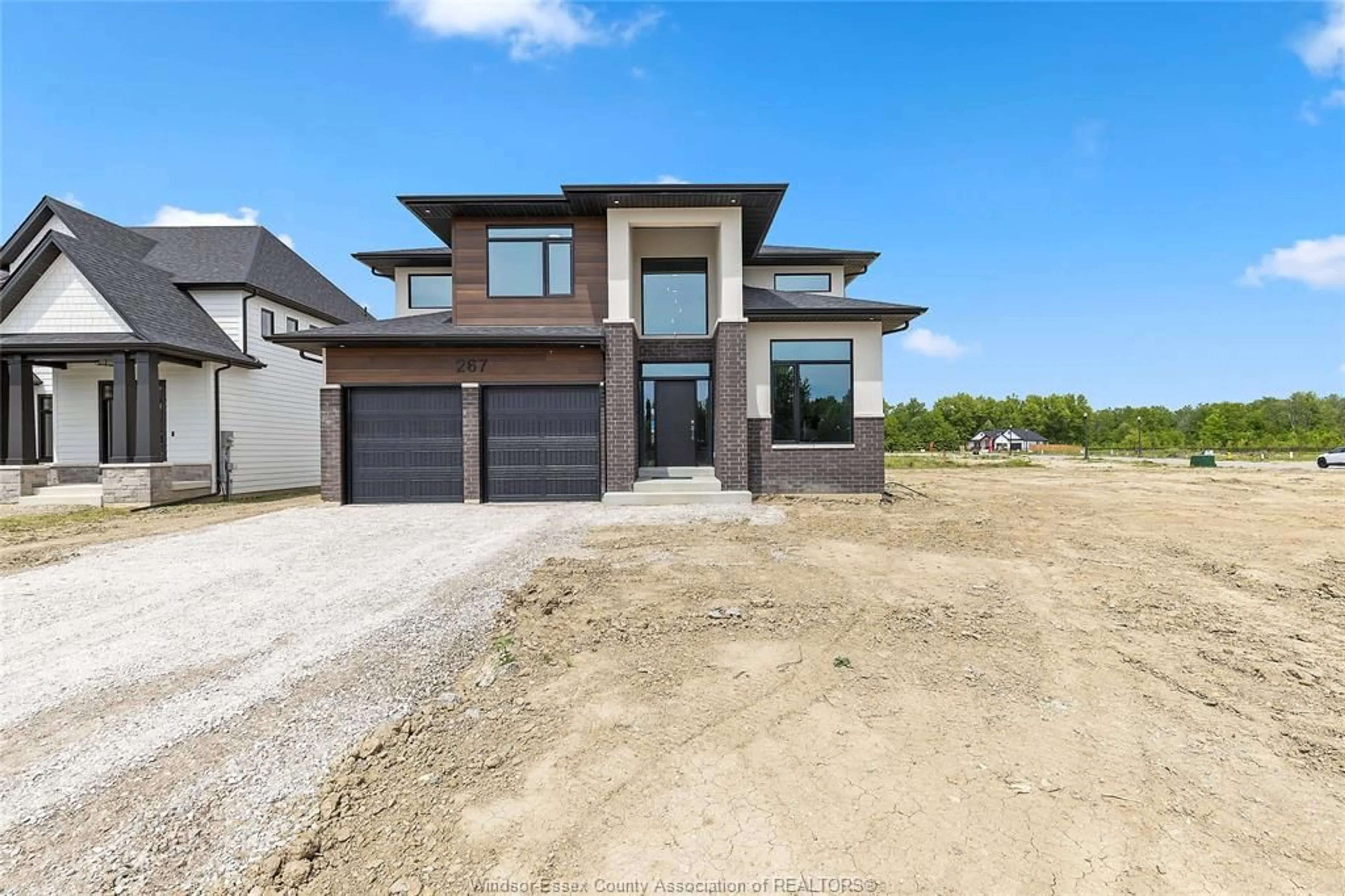 Home with brick exterior material, street for 267 JOAN FLOOD, Essex Ontario N8M 3E9