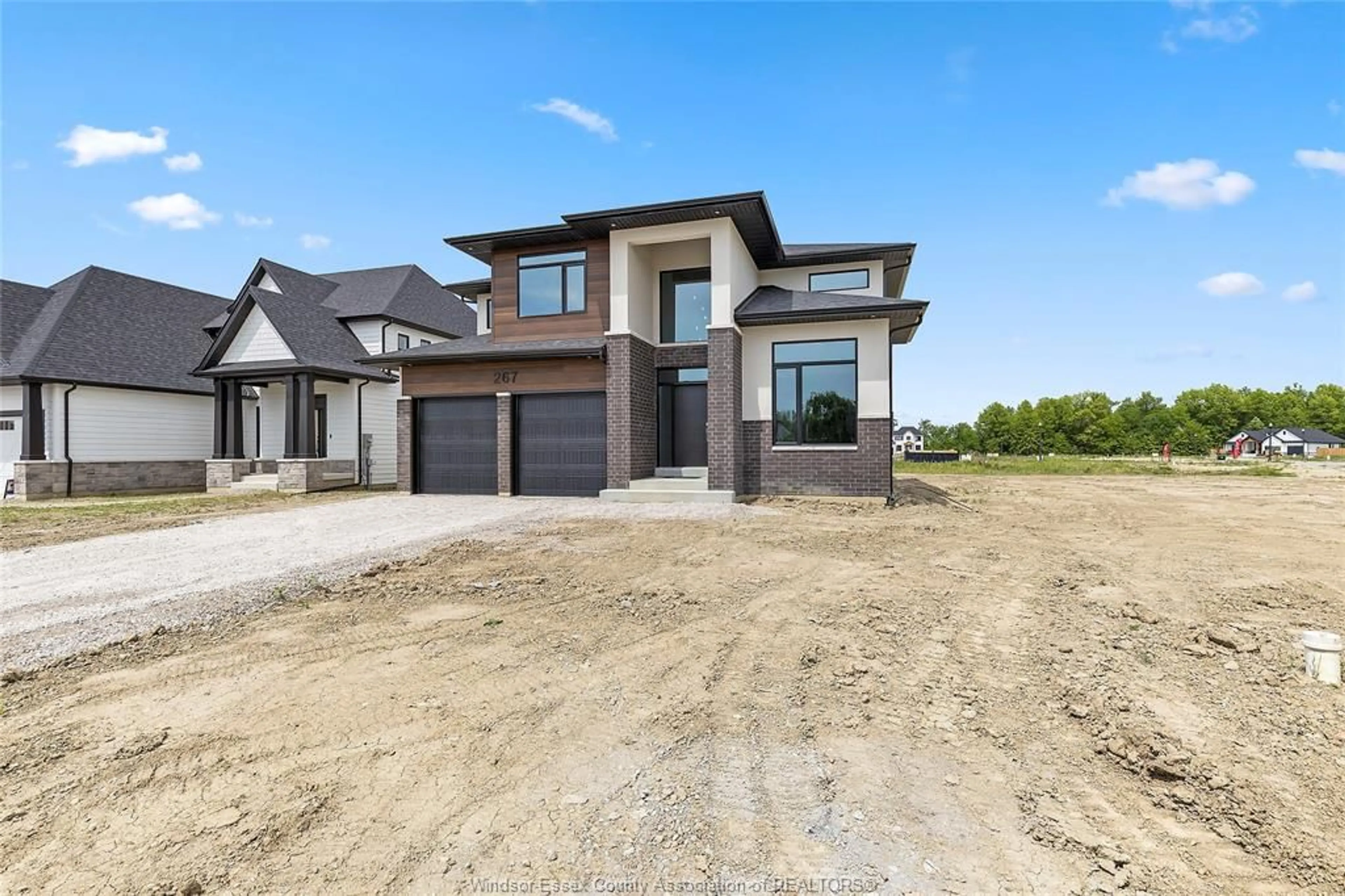 Home with brick exterior material, street for 267 JOAN FLOOD, Essex Ontario N8M 3E9