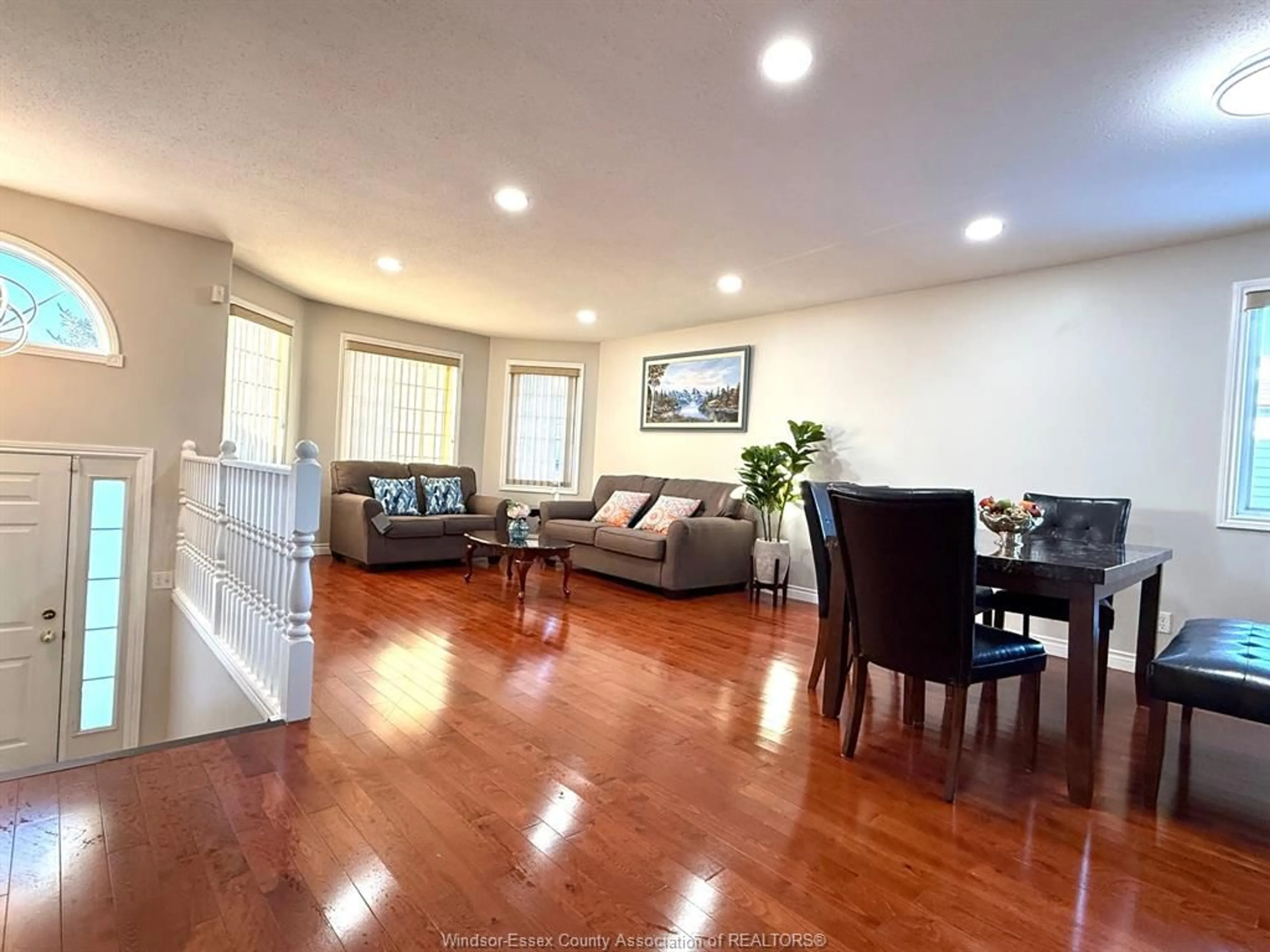 Living room with furniture, wood/laminate floor for 883 DYNASTY, Windsor Ontario N9G 2V8