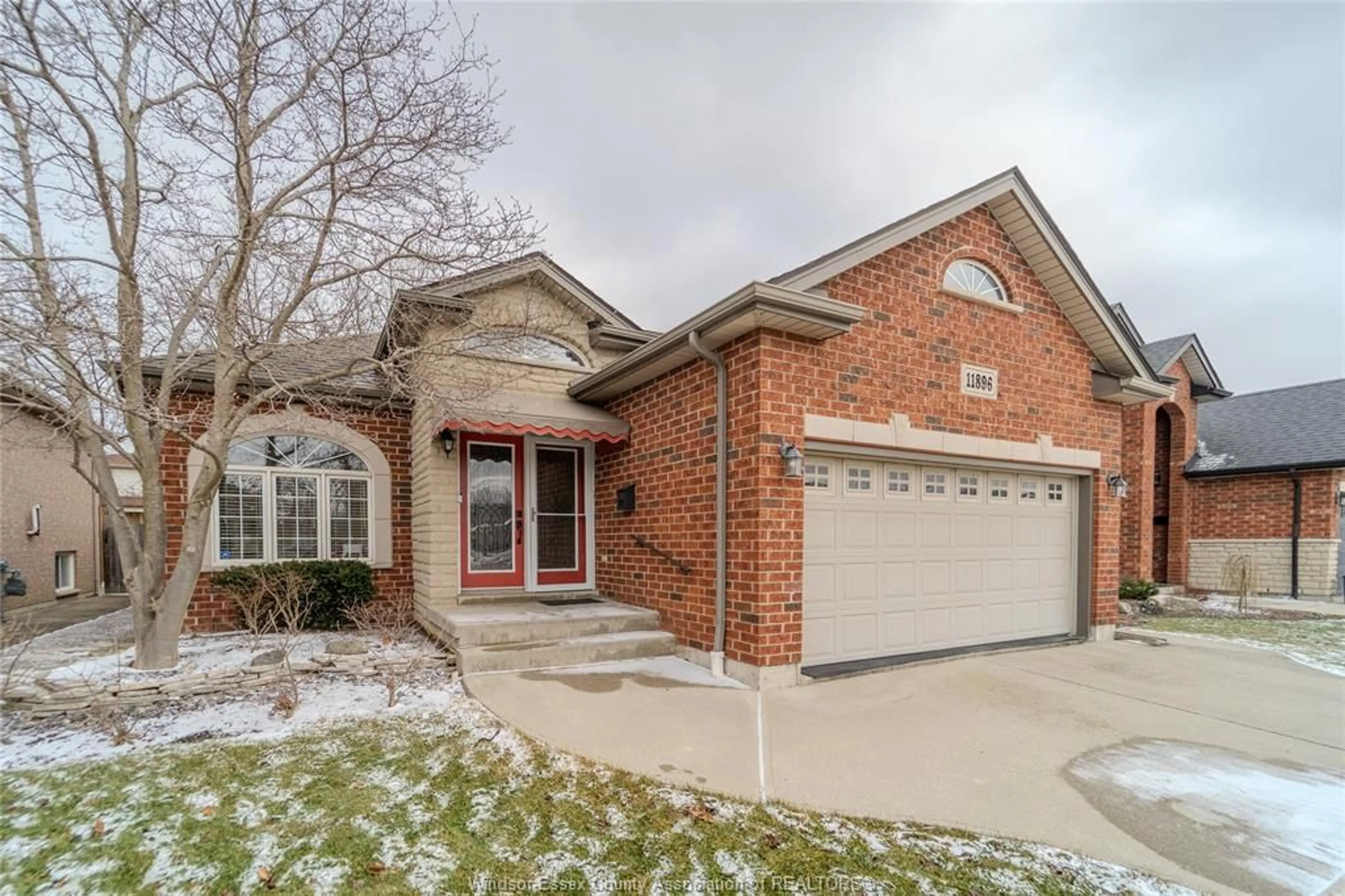 Home with brick exterior material, street for 11896 Cobllestone Cres, Windsor Ontario N8P 1T6